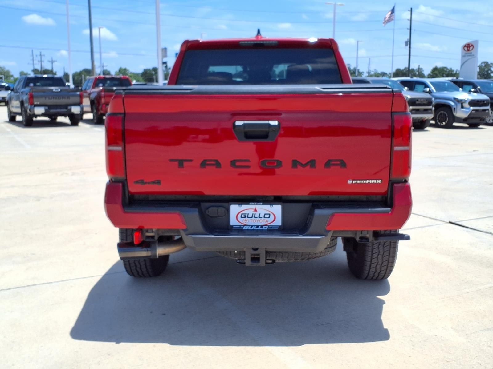 2025 Toyota Tacoma Hybrid TRD Off Road Red at EAG Ford Navasota