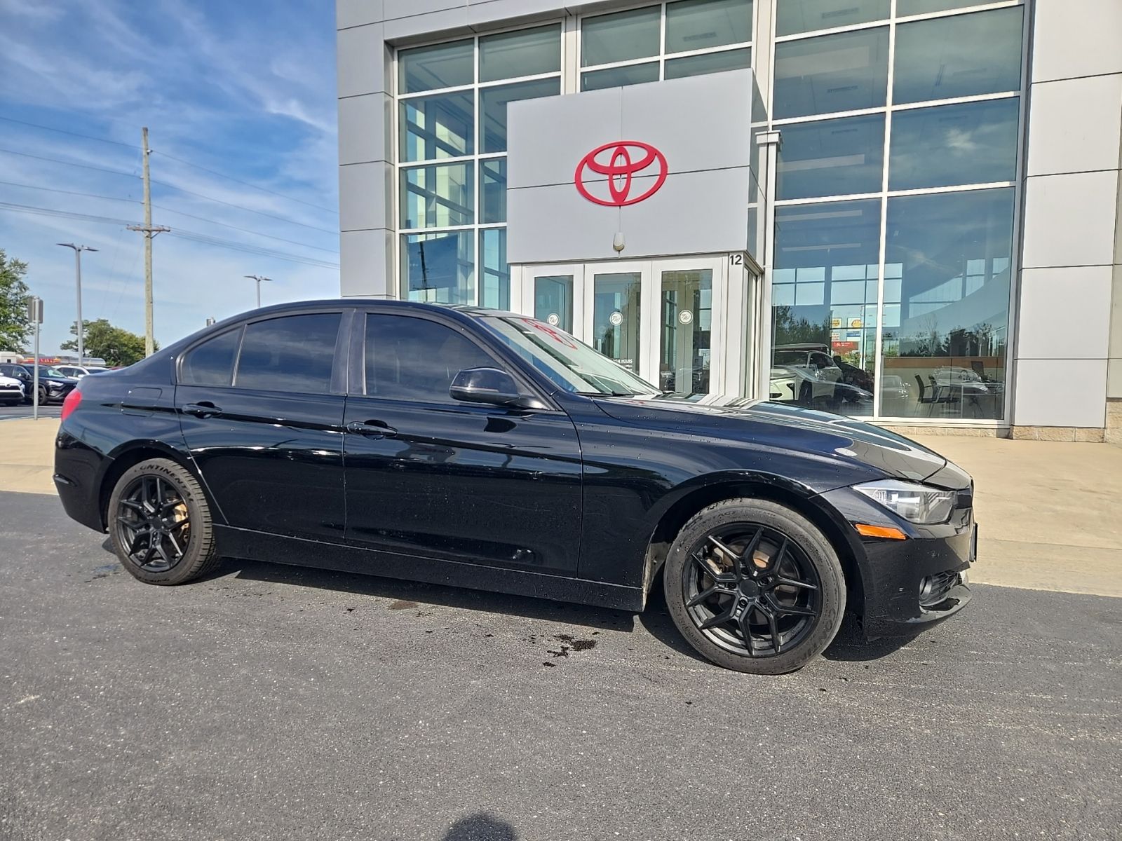 Jet Black 2013 BMW 3 Series Sedan All-Wheel Drive 8-Speed Automatic