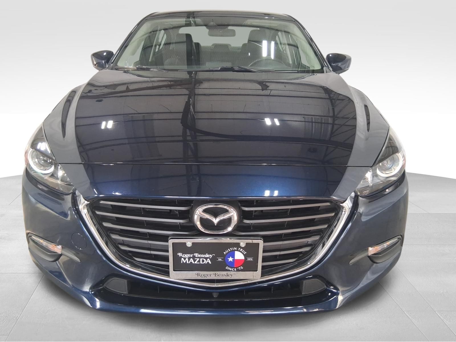 View vehicle photo 3