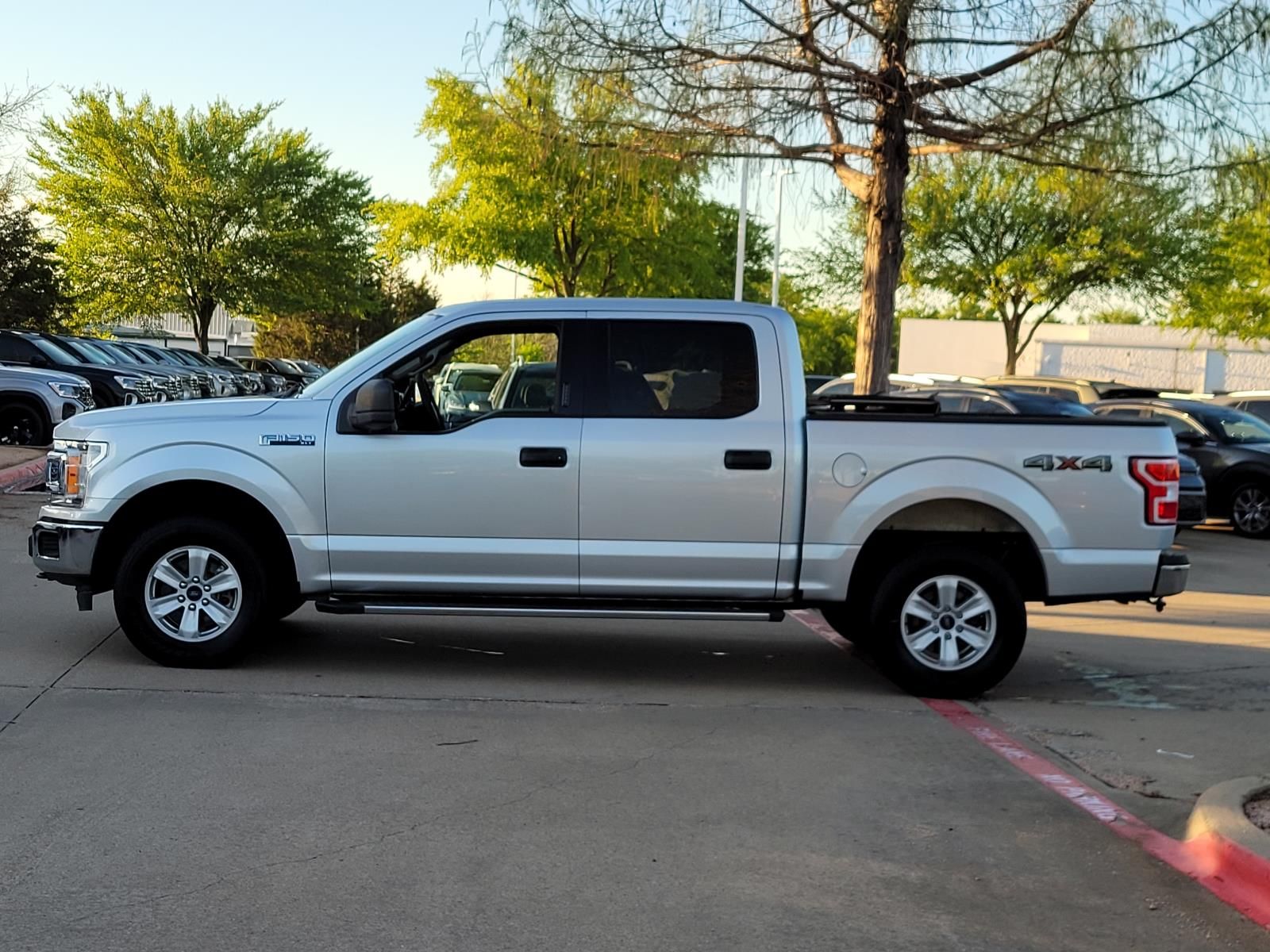 used 2018 Ford F-150 car, priced at $16,000