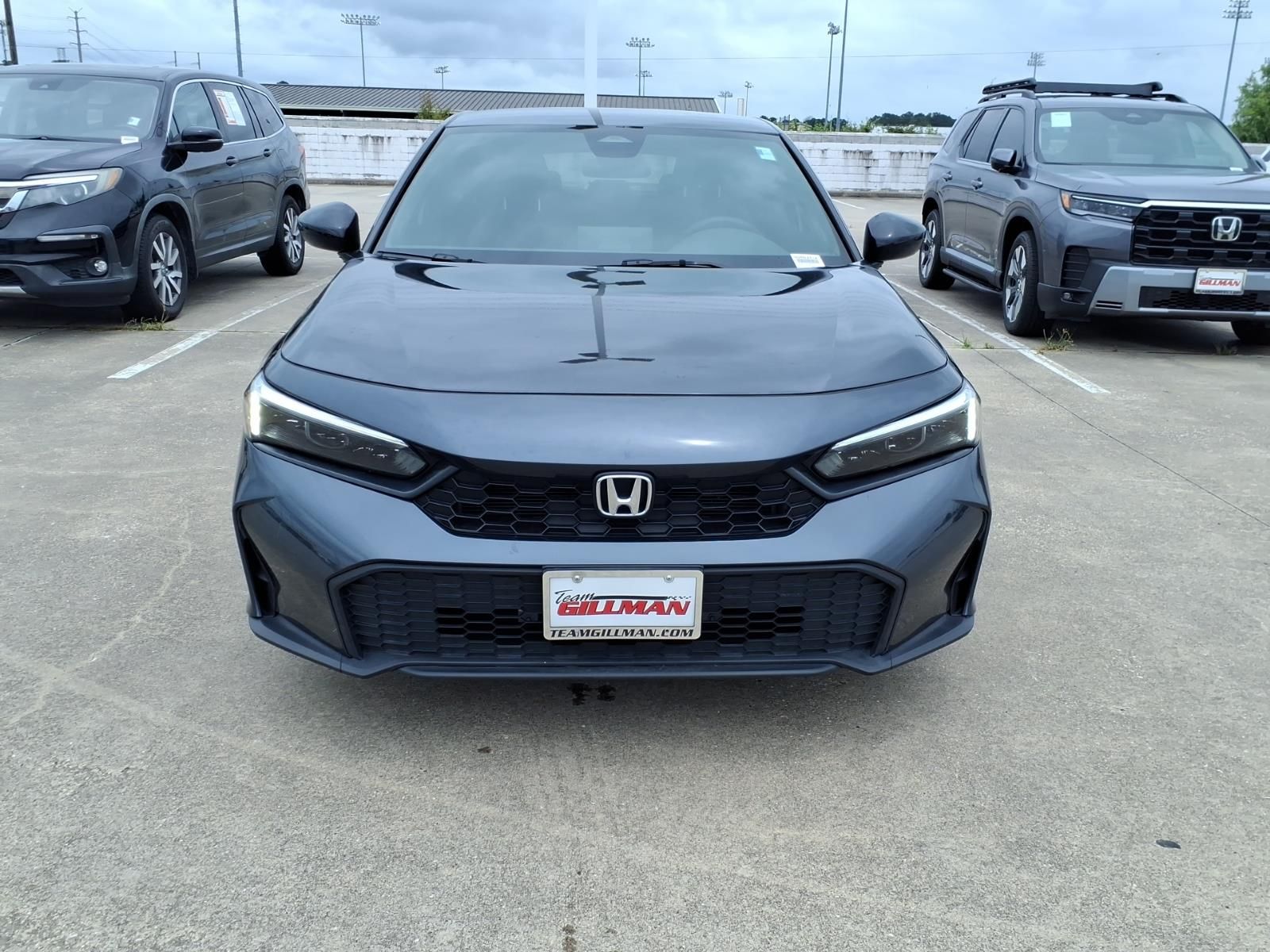 View vehicle photo 3