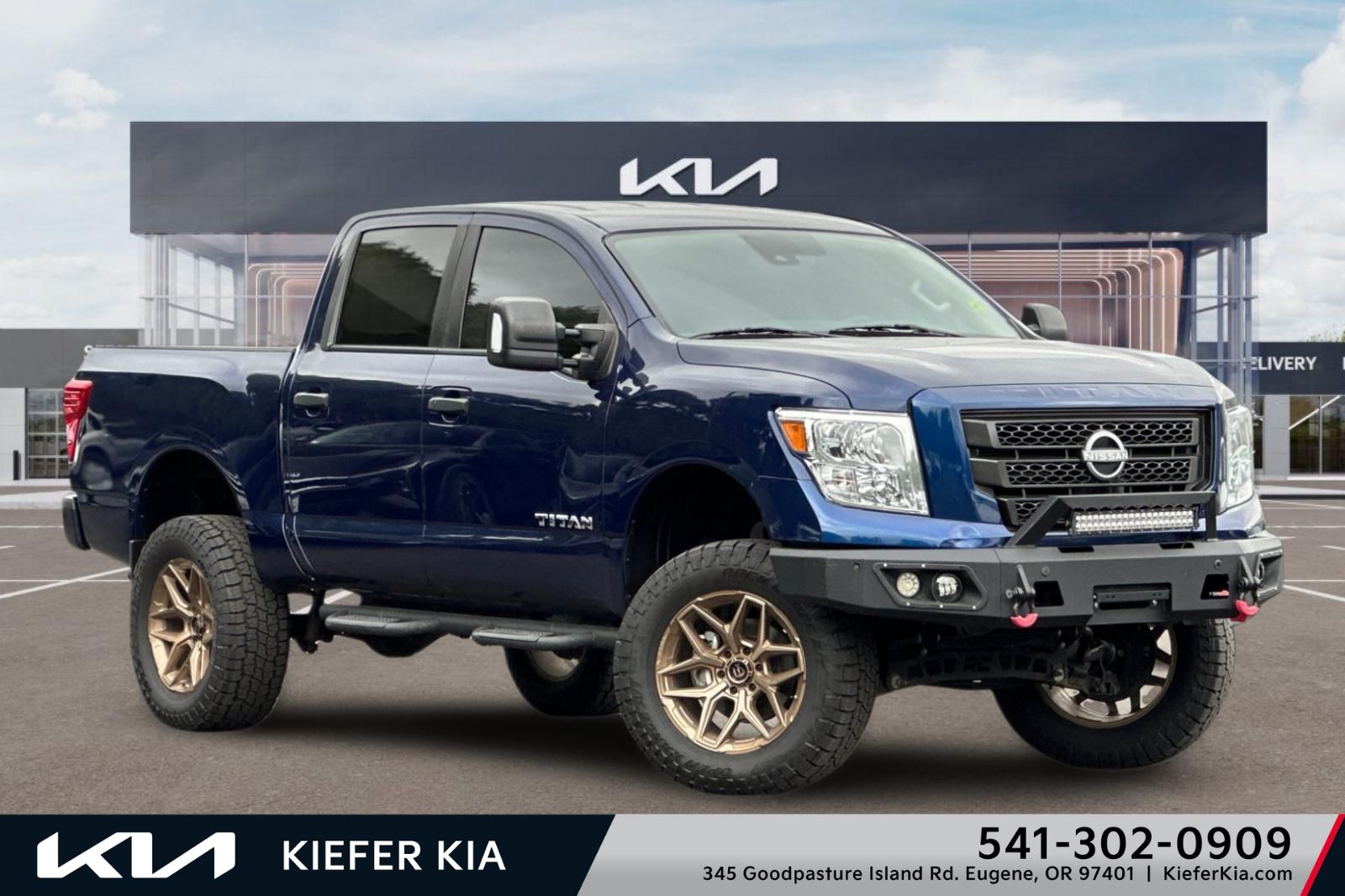Deep Blue Pearl 2023 Nissan Titan Pickup Truck Four-Wheel Drive 9-Speed Automatic