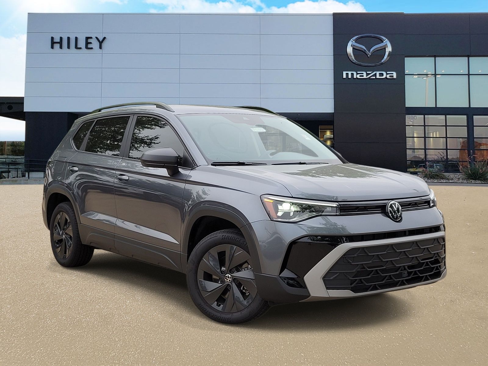 used 2025 Volkswagen Taos car, priced at $23,000