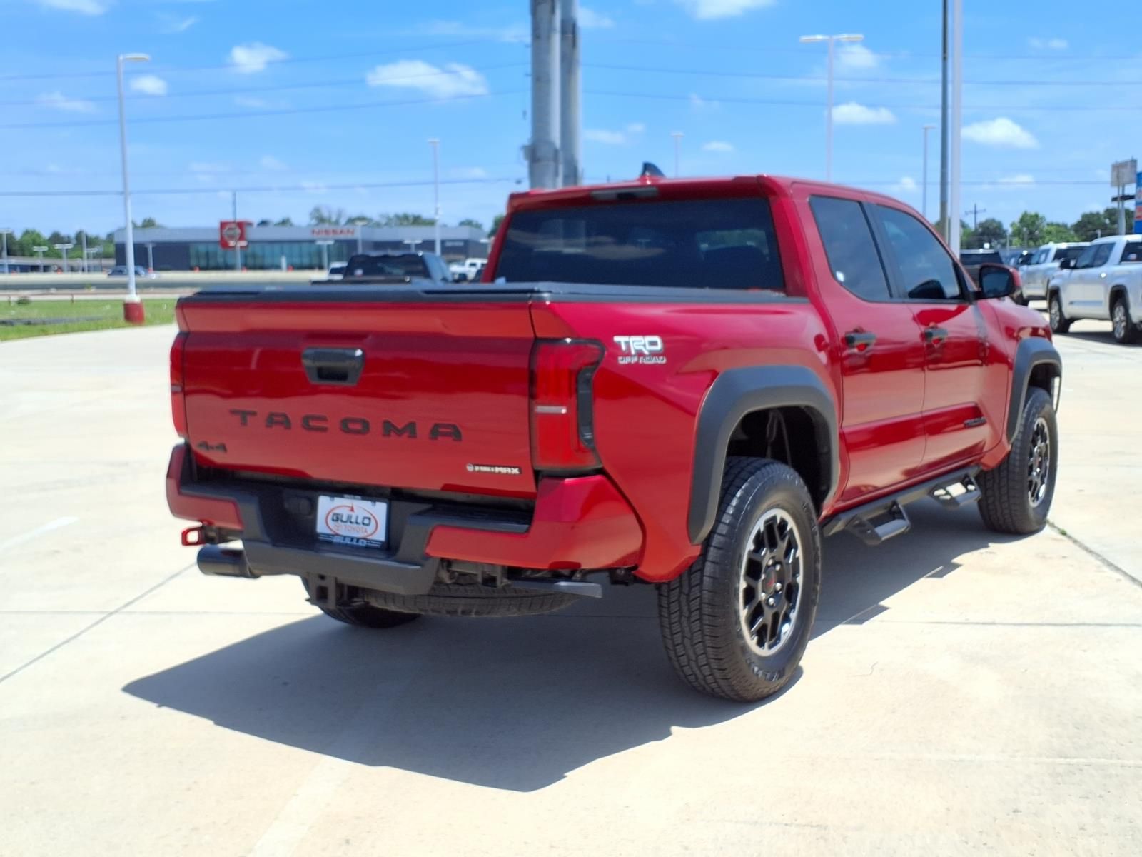 2025 Toyota Tacoma Hybrid TRD Off Road Red at EAG Ford Navasota
