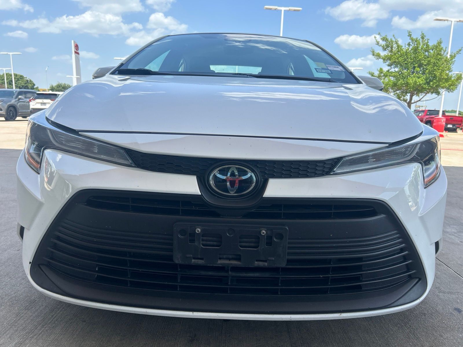 Used 2024 White Toyota LE image 2
