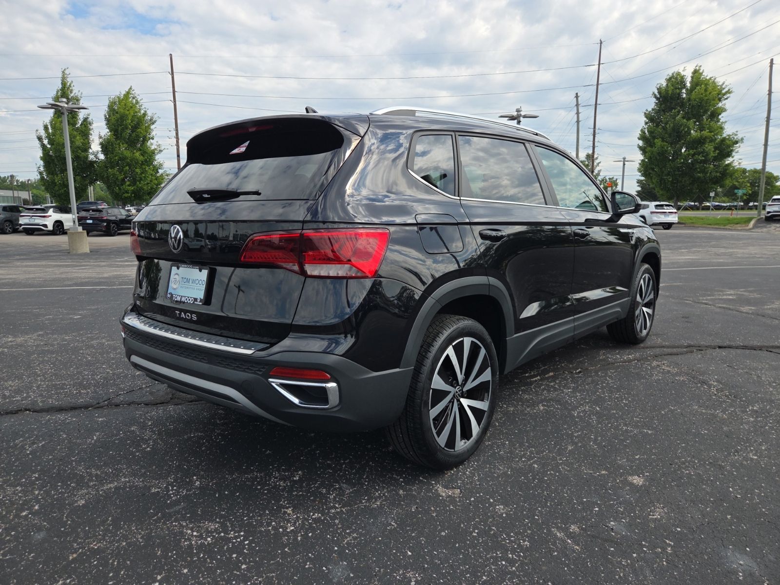 used 2023 Volkswagen Taos car, priced at $24,150