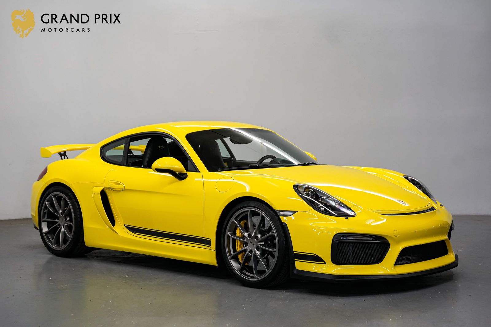 Racing Yellow 2016 Porsche Cayman Coupe Rear-Wheel Drive 6-Speed Manual