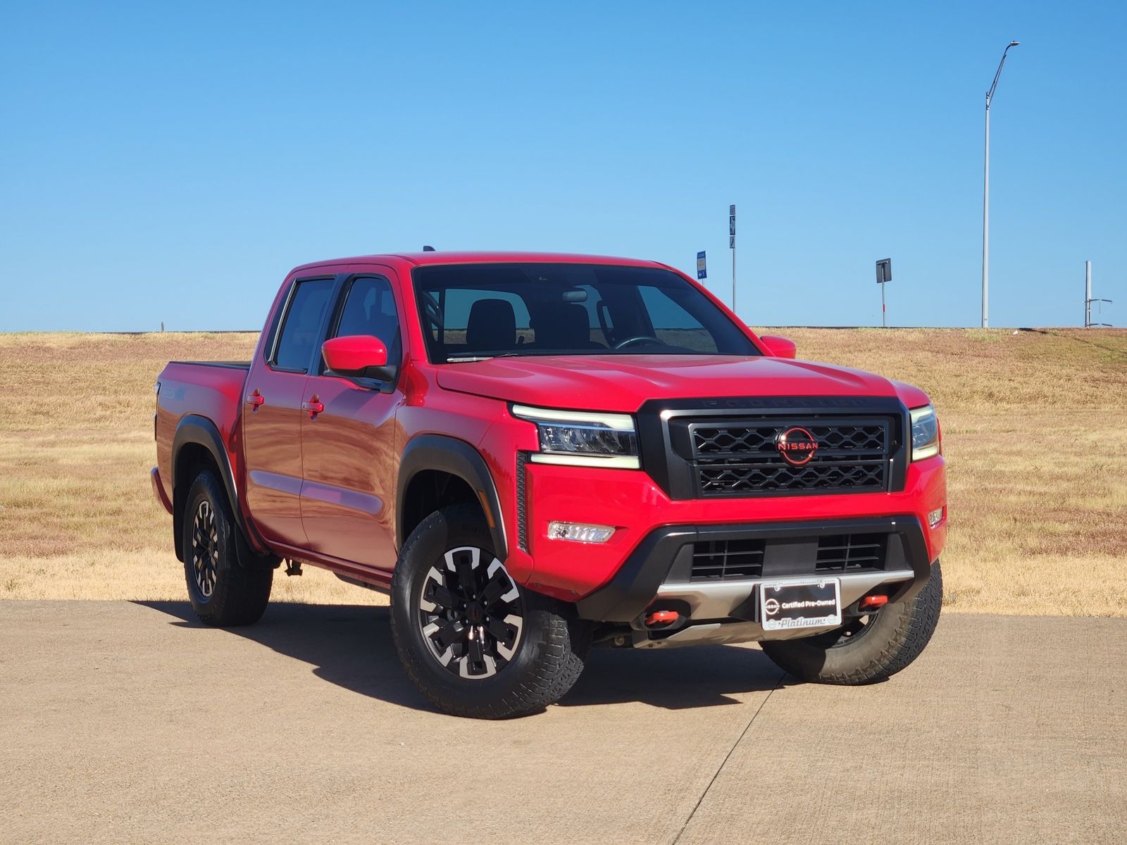 Red Alert 2024 Nissan Frontier Pickup Truck Four-Wheel Drive 9-Speed Automatic Overdrive