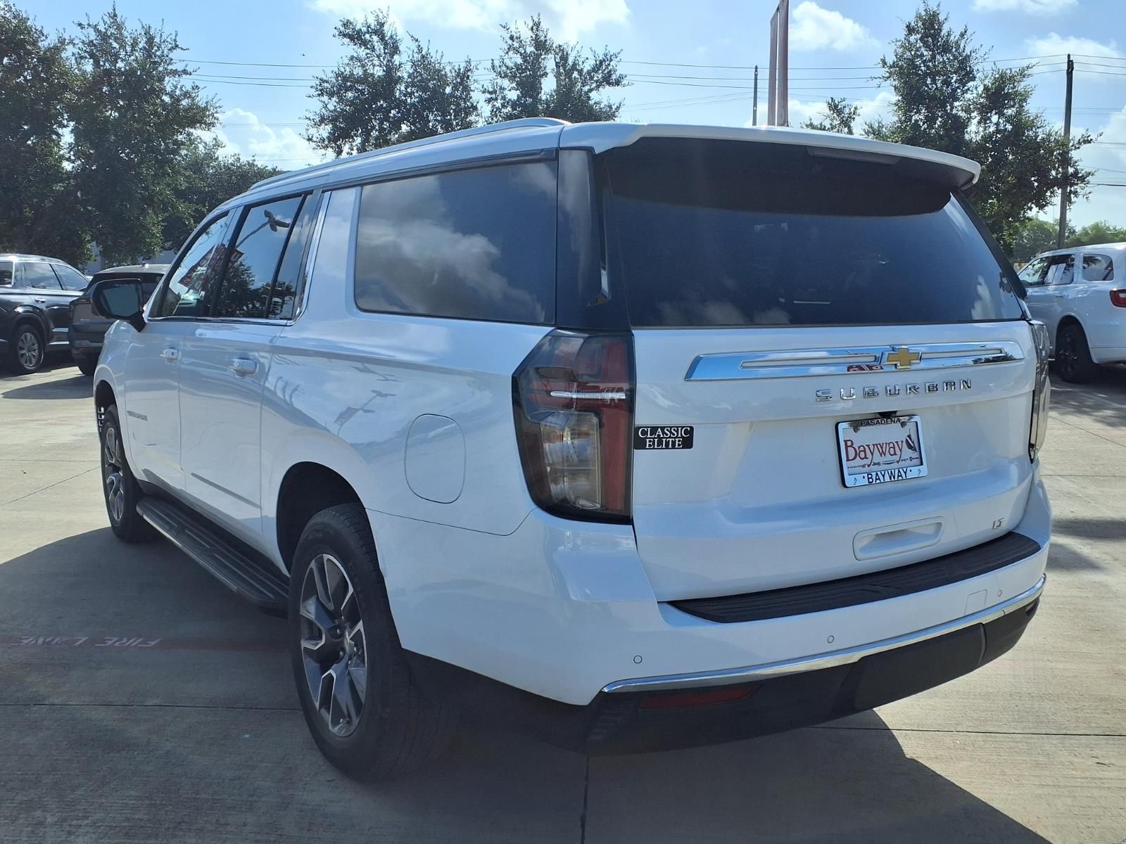 2024 Chevrolet Suburban LT White at Victoria Chrysler Dodge Jeep Ram