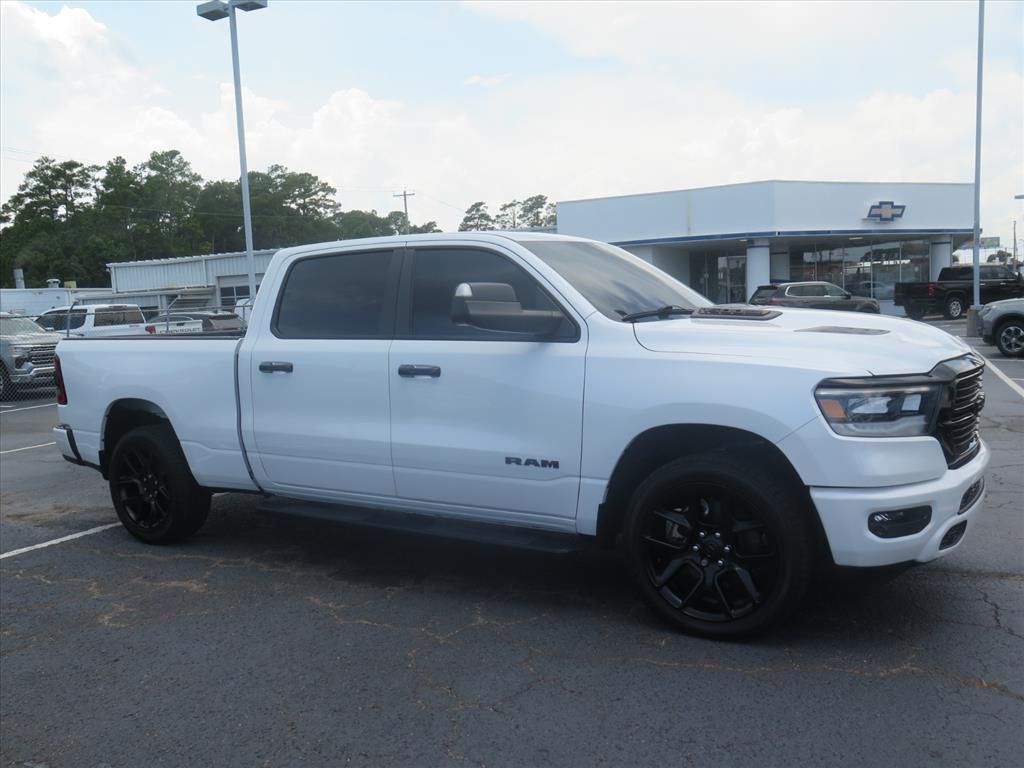 Ivory White Tri-Coat Pearlcoat 2024 RAM 1500 Pickup Truck Four-Wheel Drive 8-Speed Automatic