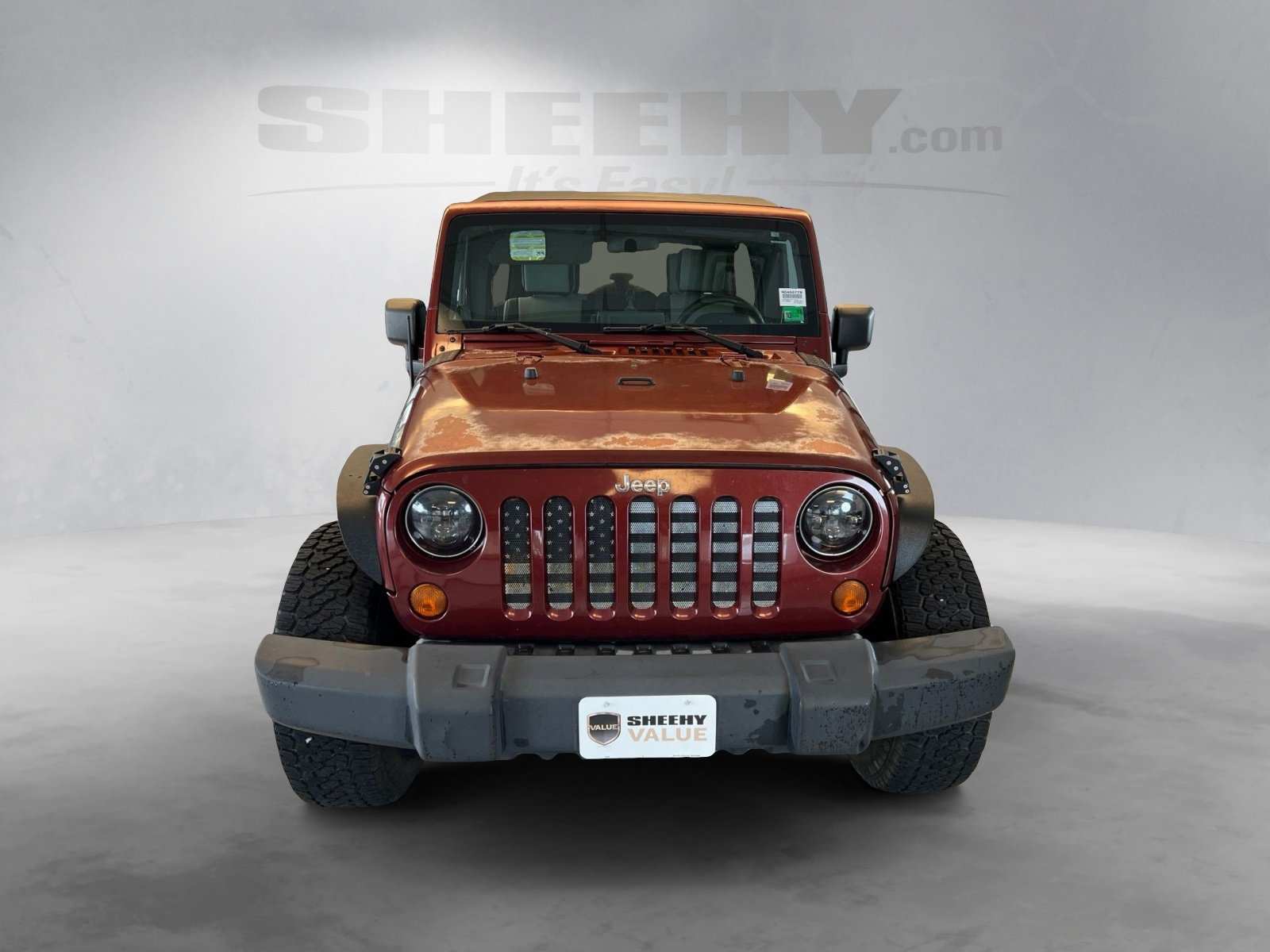 Used 2007 Red Rock Crystal Pearlcoat Jeep Unlimited X image 16