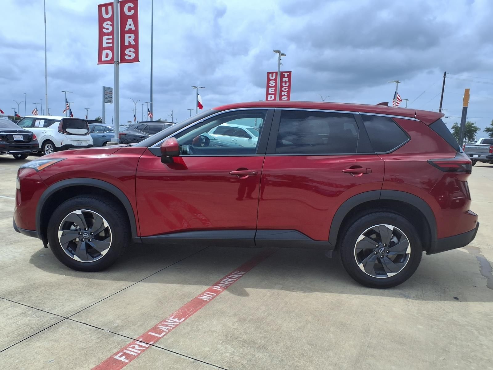 2025 Nissan Rogue SV Red at Central Houston Nissan