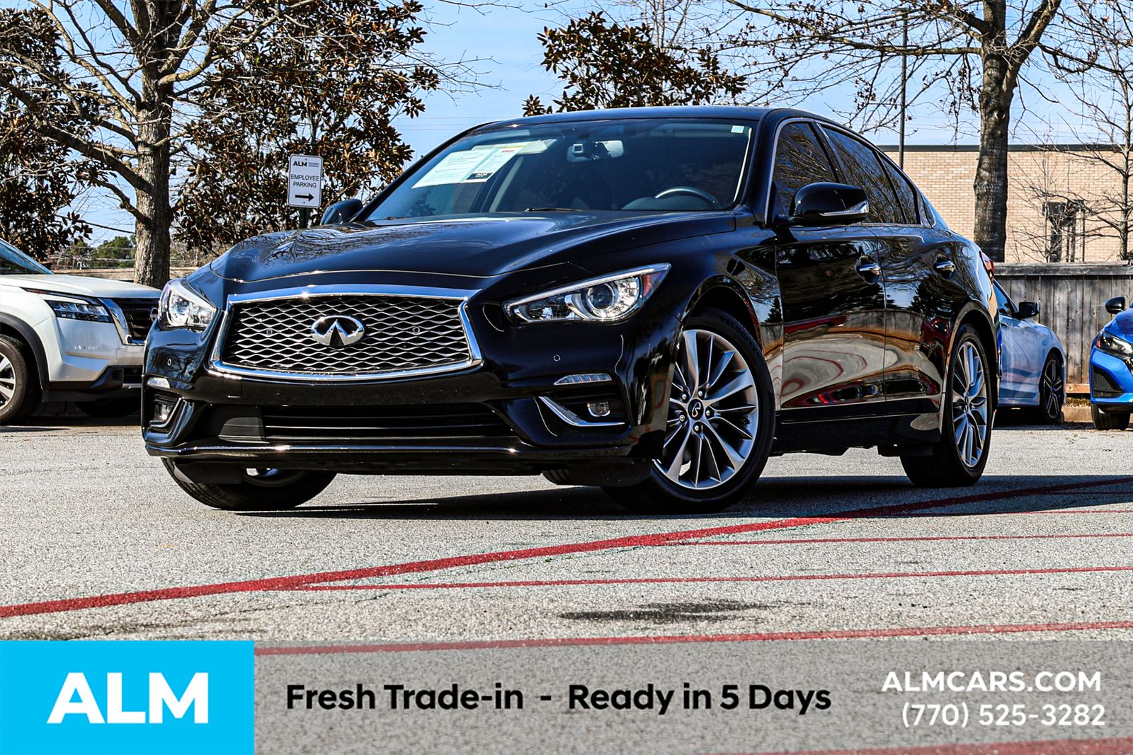 Used 2024 Black INFINITI LUXE image 2