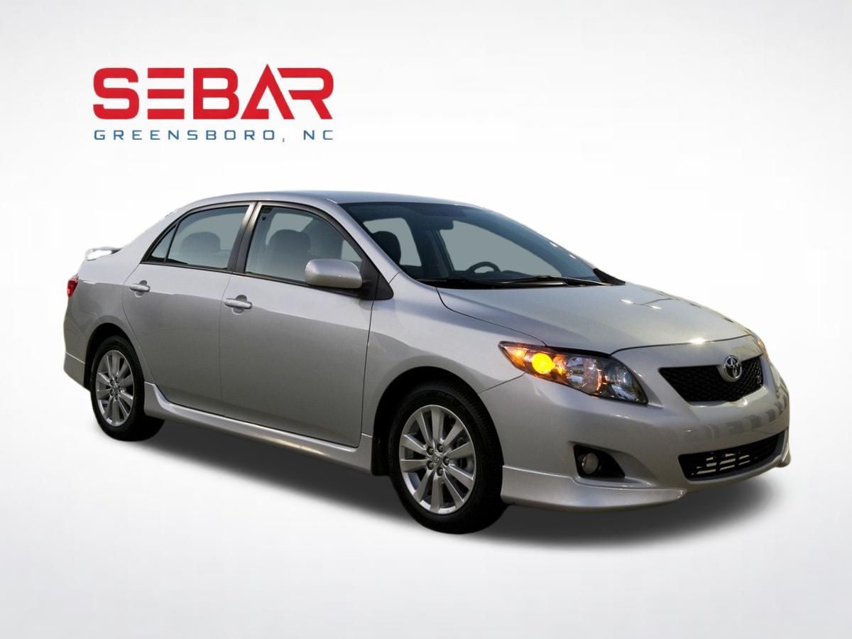 Red 2010 Toyota Corolla Sedan Front-Wheel Drive 4-Speed Automatic