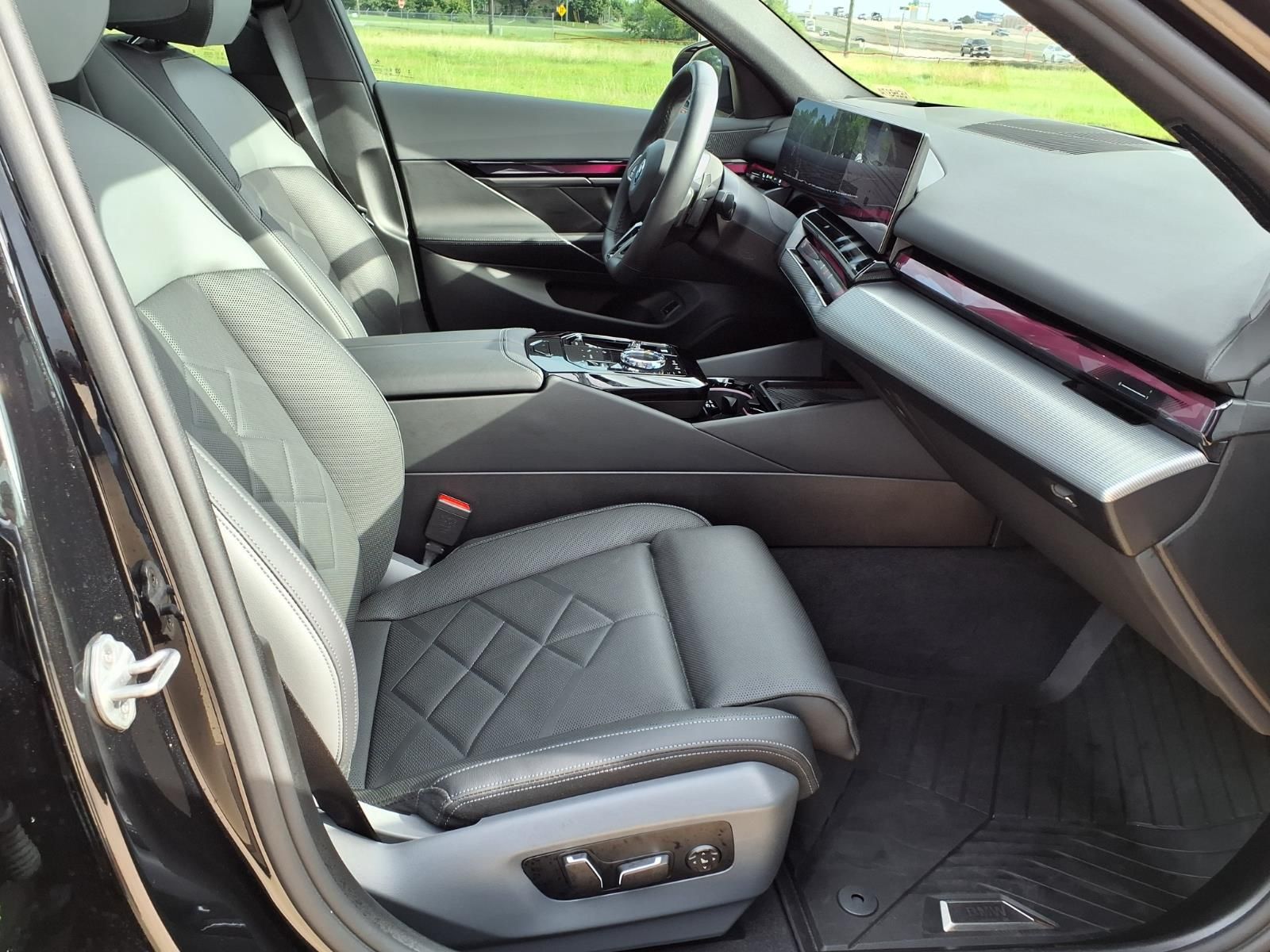 2026 BMW 5 Series 550e xDrive Black at Central Houston Nissan