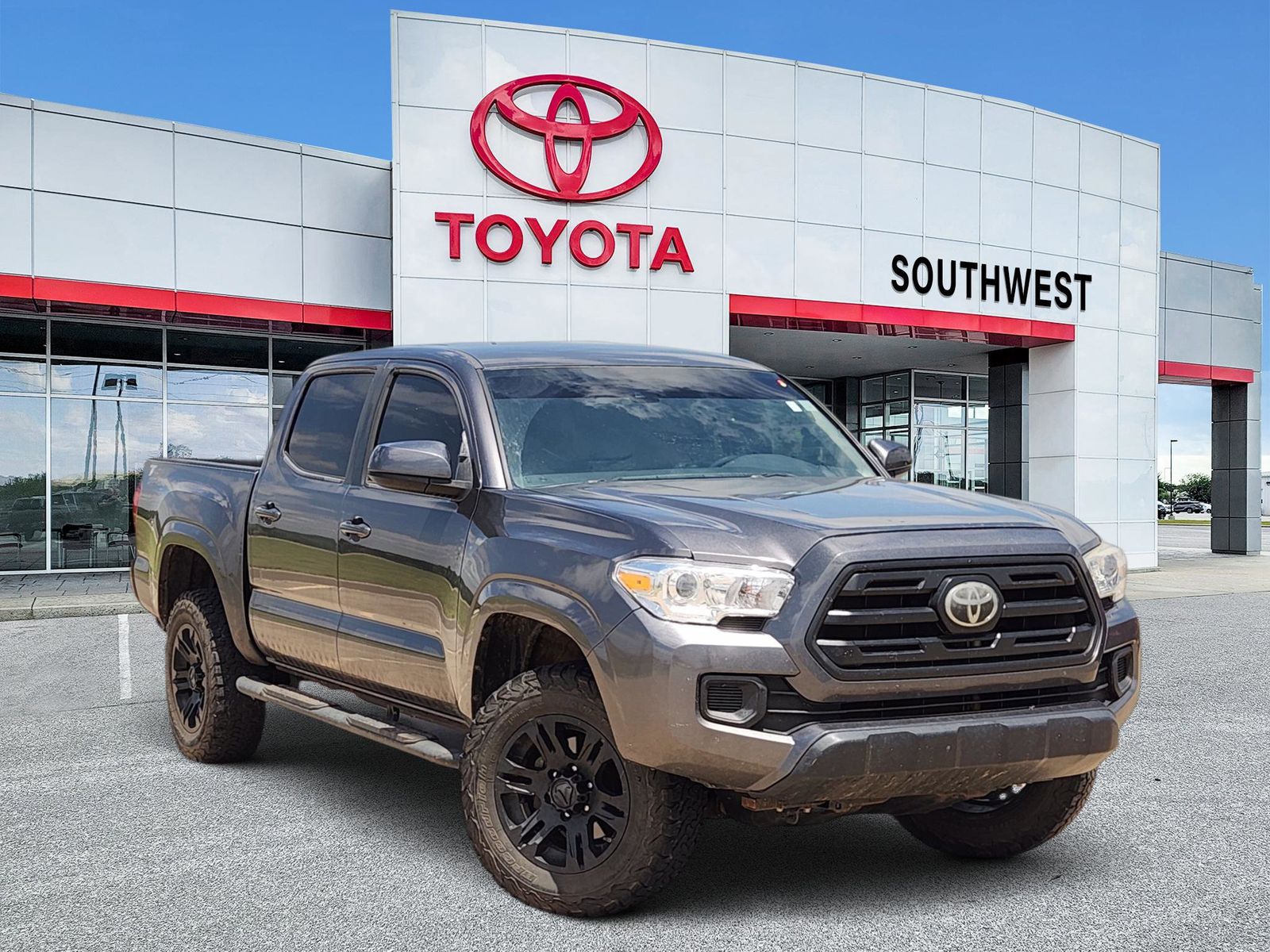 Magnetic Gray Metallic 2019 Toyota Tacoma SR I4 Double Cab RWD Pickup Truck 4X2 6-Speed Automatic