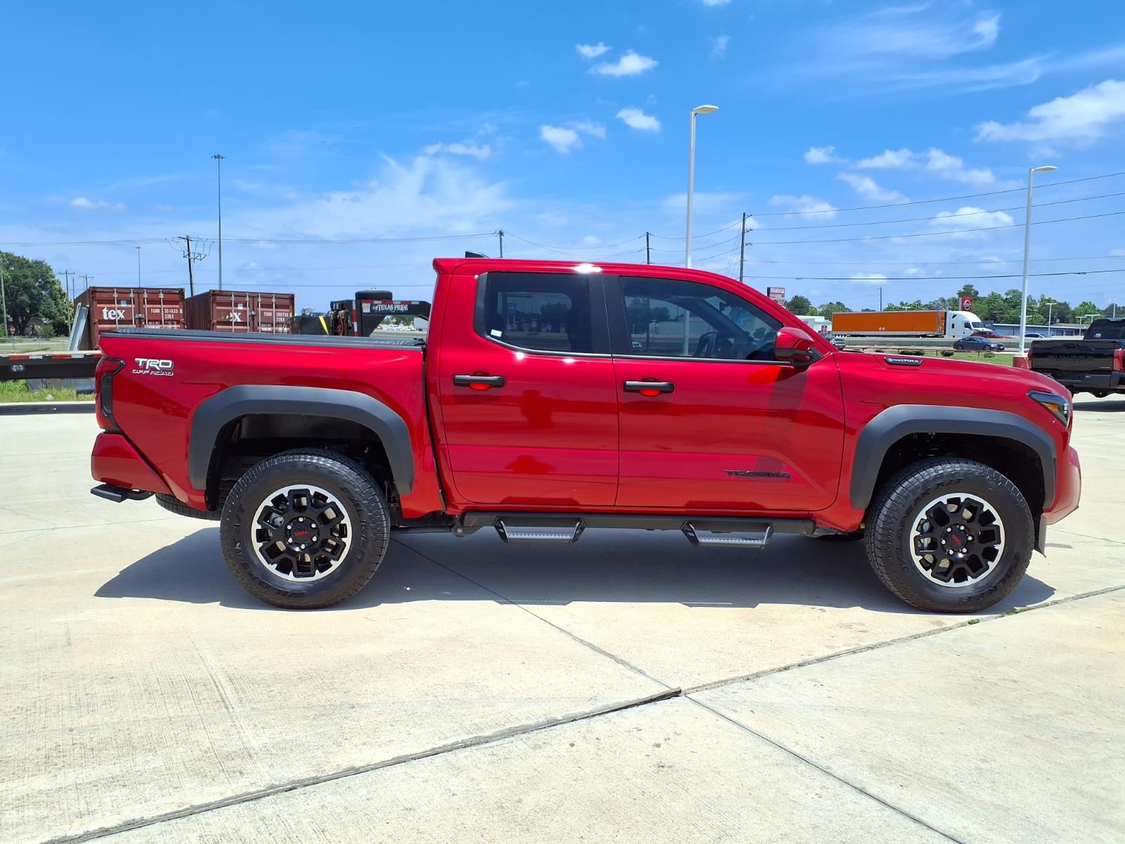 2025 Toyota Tacoma Hybrid TRD Off Road Red at EAG Ford Navasota