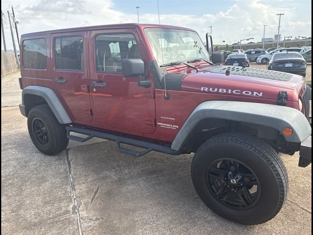 2013 Jeep Wrangler Rojo (Deep Cherry Red Crystal Pearlcoat) SUV/Crossover Todo terreno 5 velocidades Automática