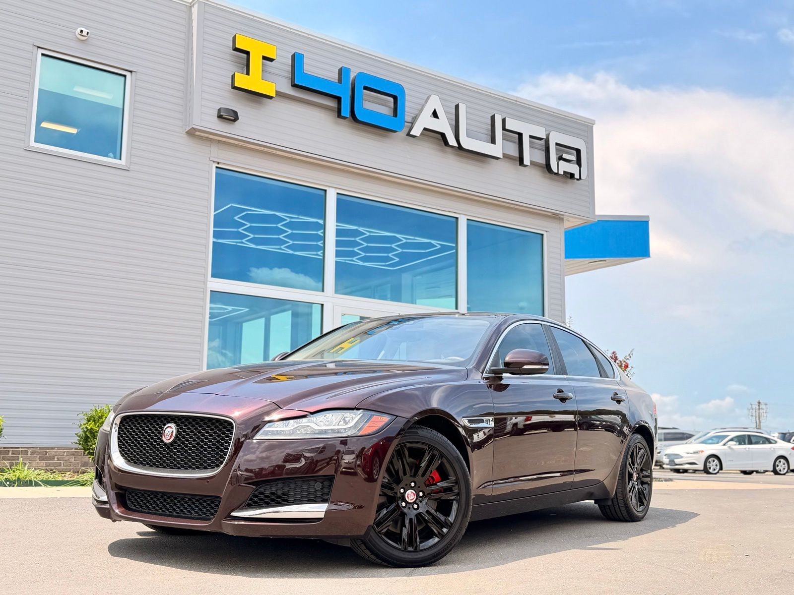 Aurora Red Metallic 2016 Jaguar XF Sedan Rear-Wheel Drive 8-Speed Automatic