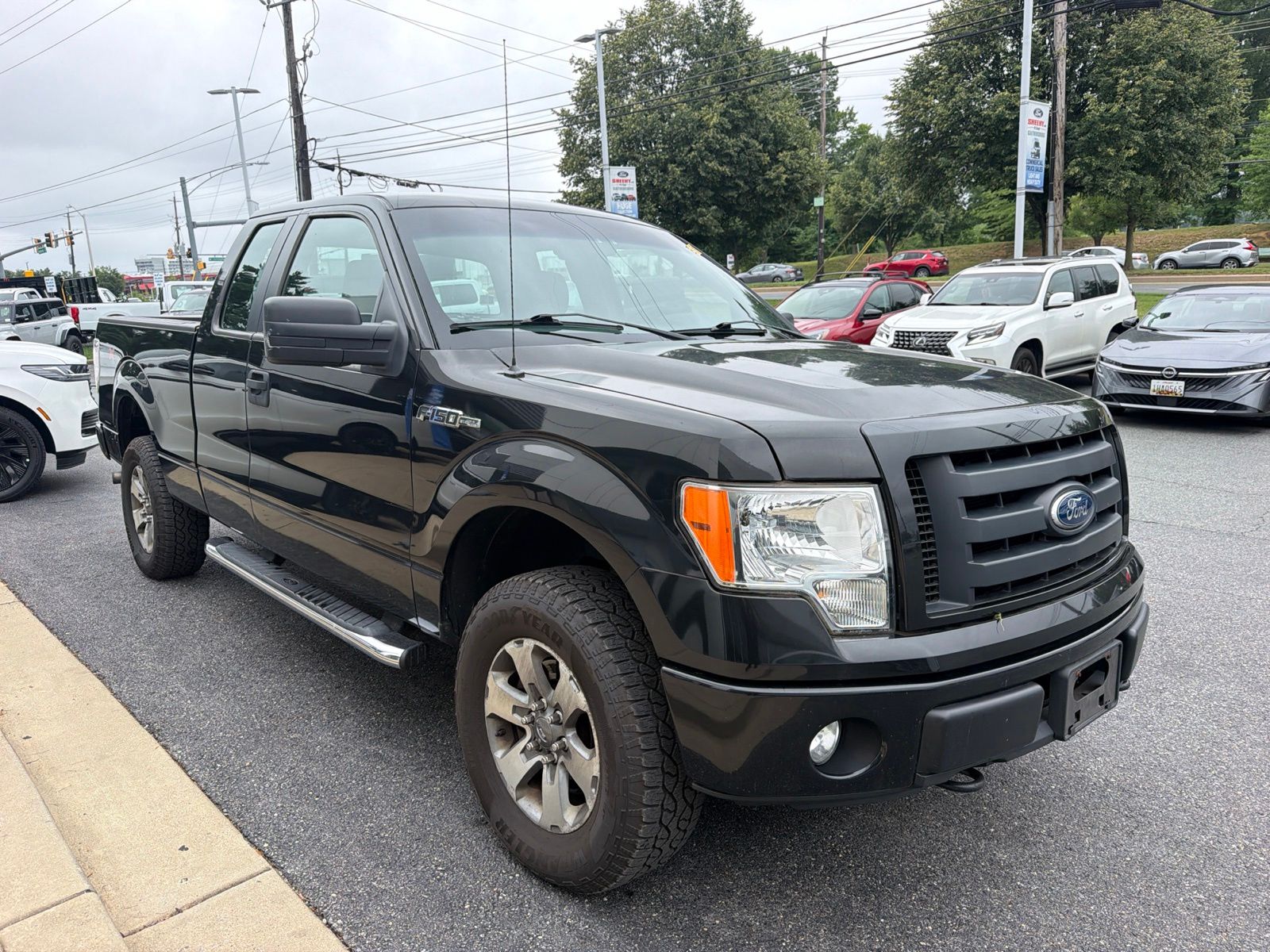 Tuxedo Black Metallic 2011 Ford F-150 Pickup Truck Four-Wheel Drive 6-Speed Automatic