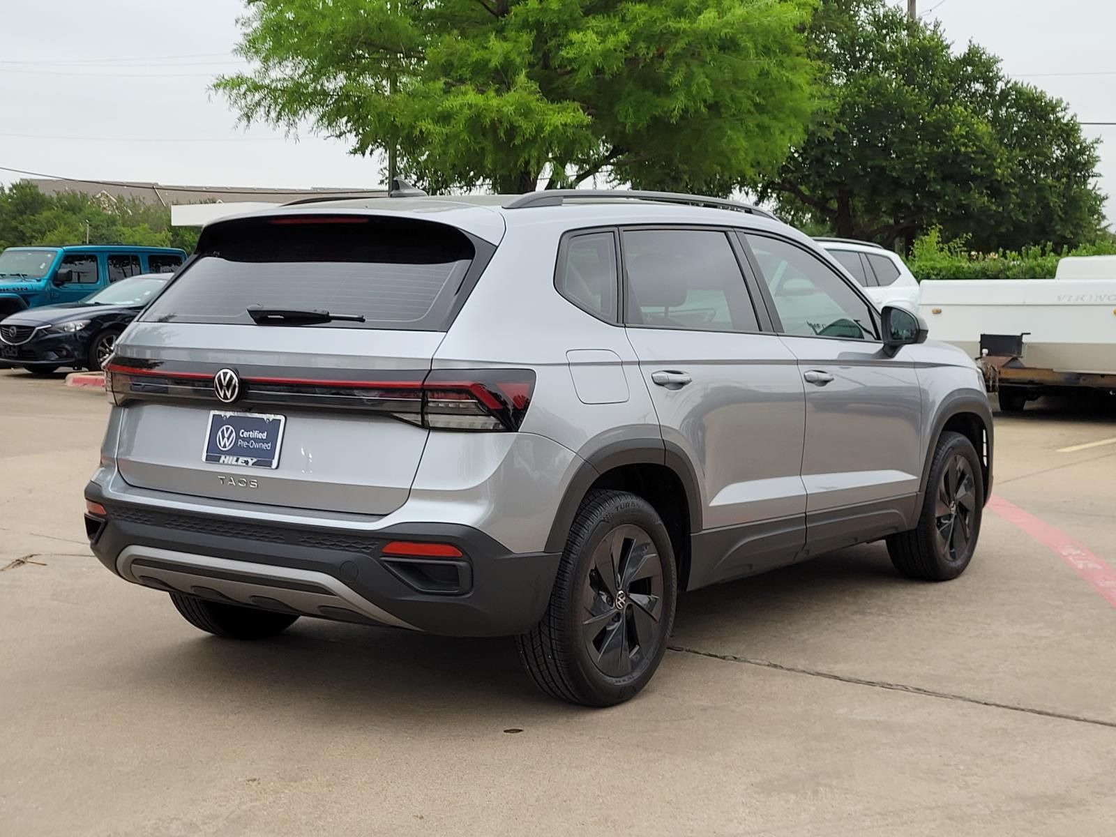 used 2025 Volkswagen Taos car, priced at $23,000