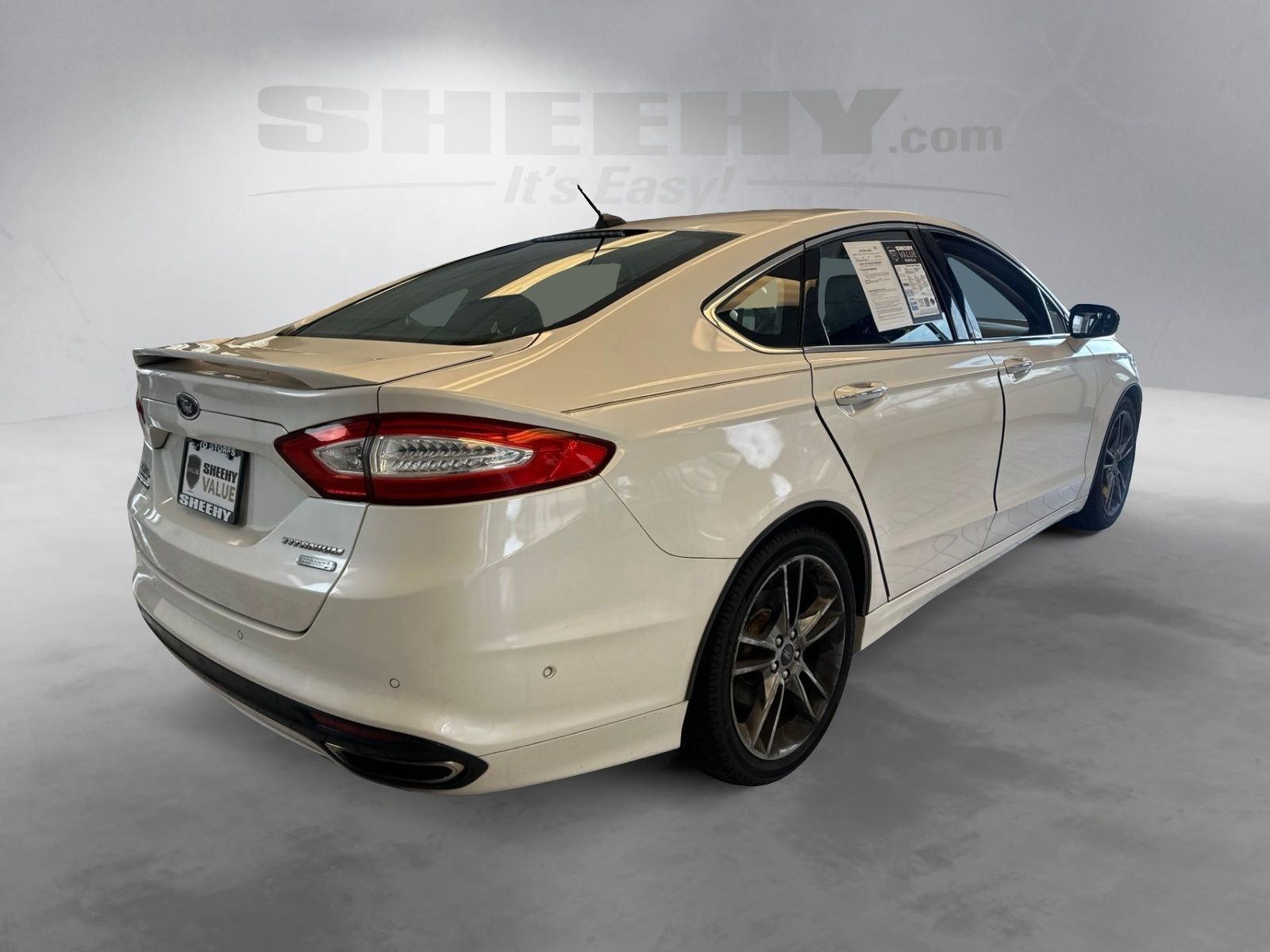 Used 2014 White Platinum Clearcoat Metallic Ford Titanium image 11
