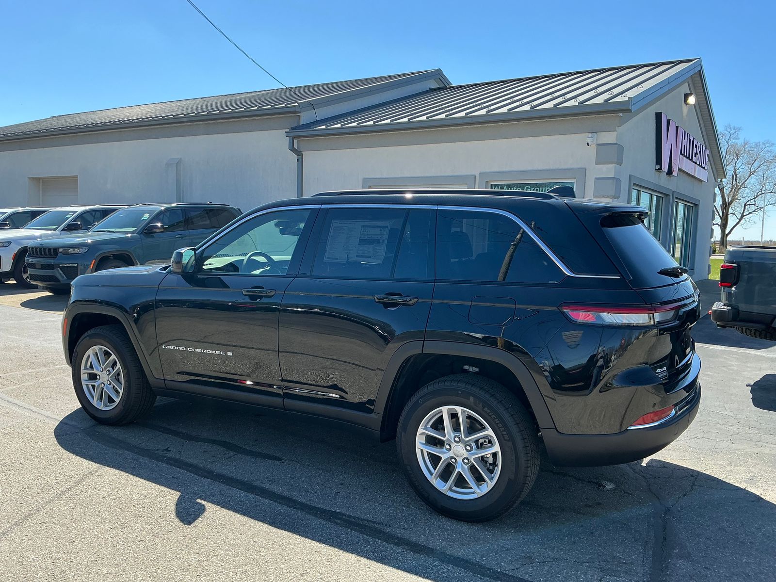 View vehicle photo 2