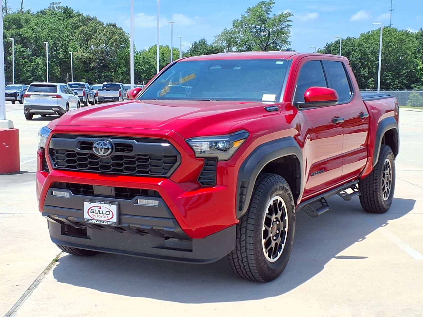 2025 Toyota Tacoma Hybrid TRD Off Road Red at EAG Ford Navasota