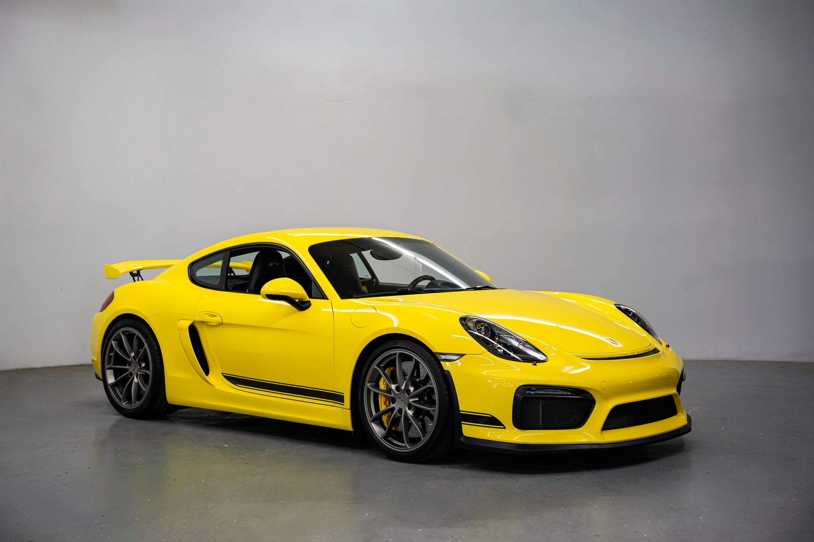 Racing Yellow 2016 Porsche Cayman Coupe Rear-Wheel Drive 6-Speed Manual