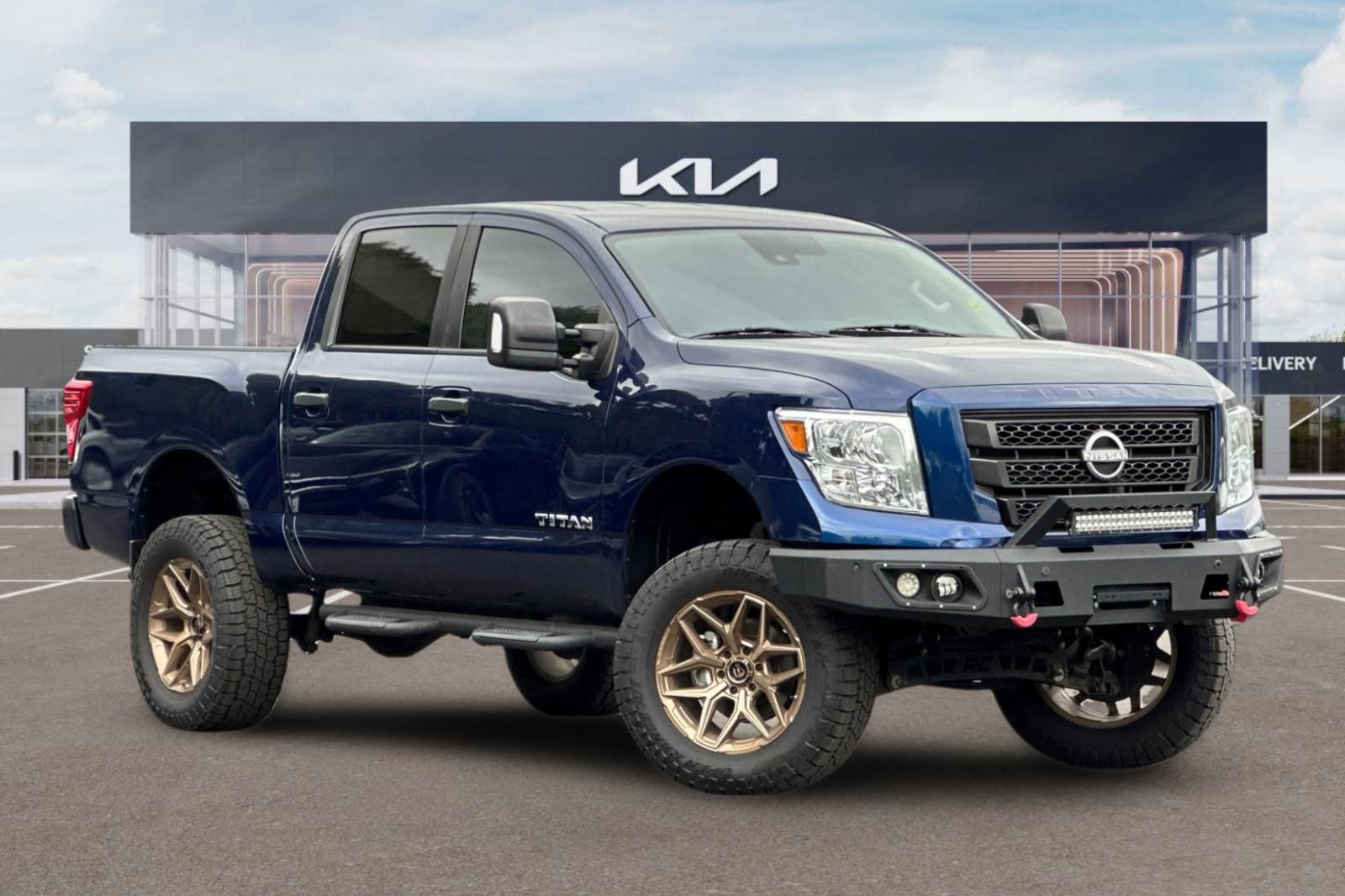 Deep Blue Pearl 2023 Nissan Titan Pickup Truck Four-Wheel Drive 9-Speed Automatic