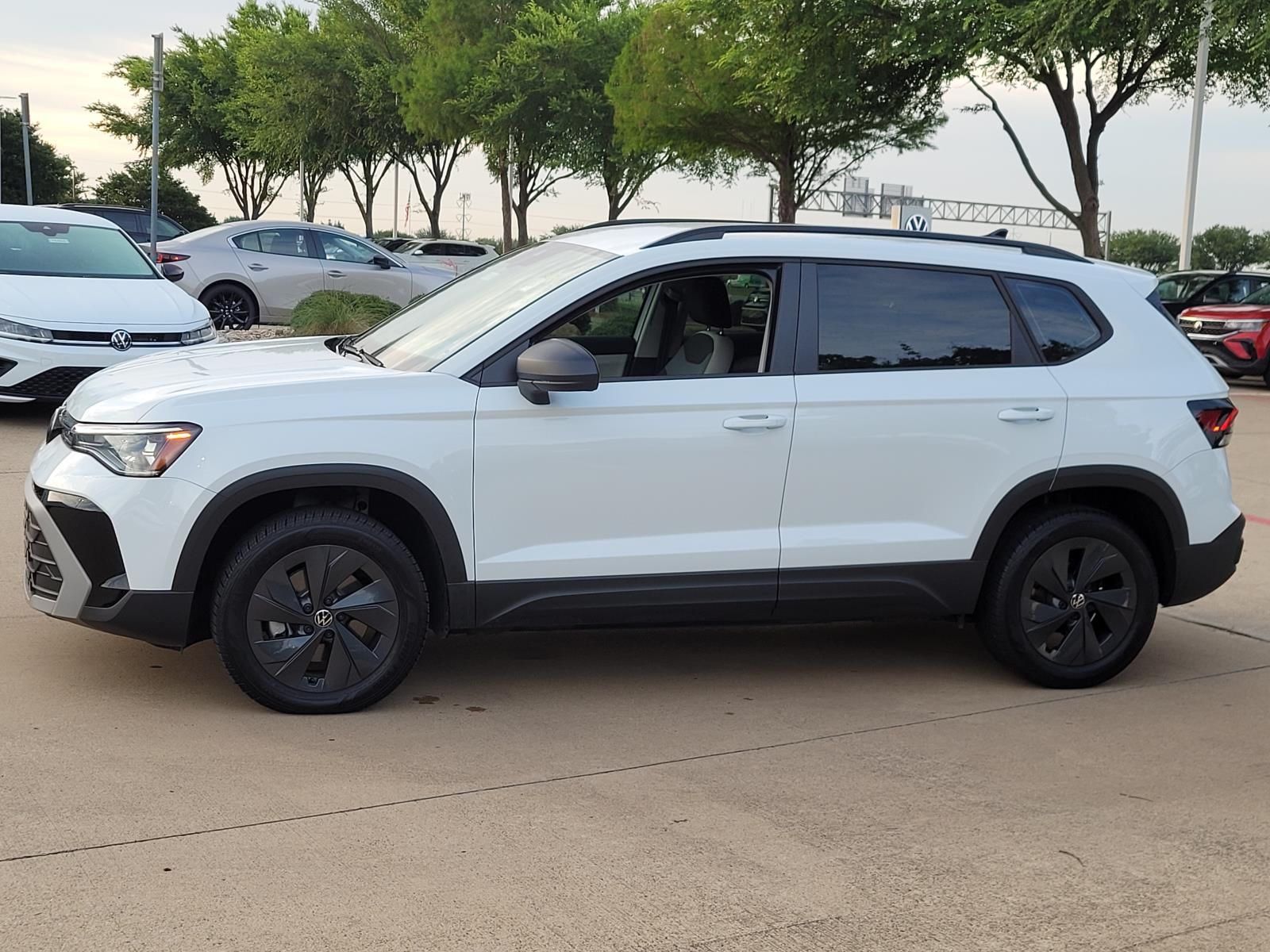 used 2025 Volkswagen Taos car, priced at $23,000