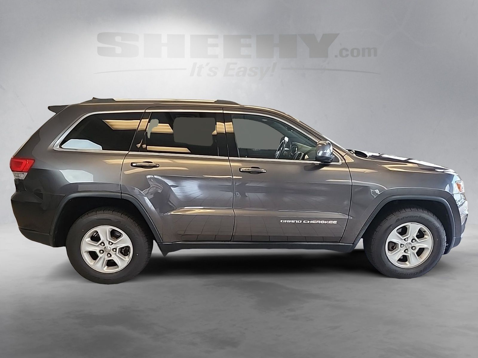 Used 2014 Granite Crystal Clearcoat Metallic Jeep Laredo image 10