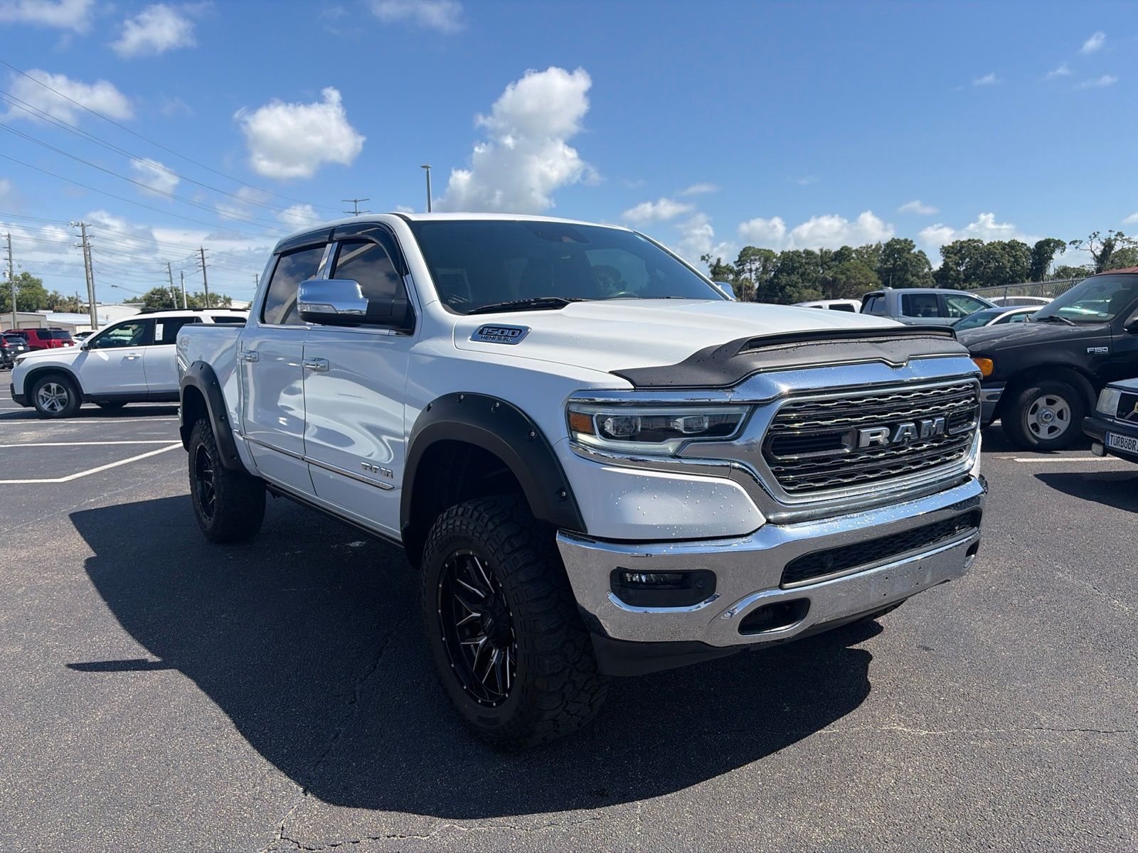 Ivory White 2019 RAM 1500 Pickup Truck Four-Wheel Drive 8-Speed Automatic
