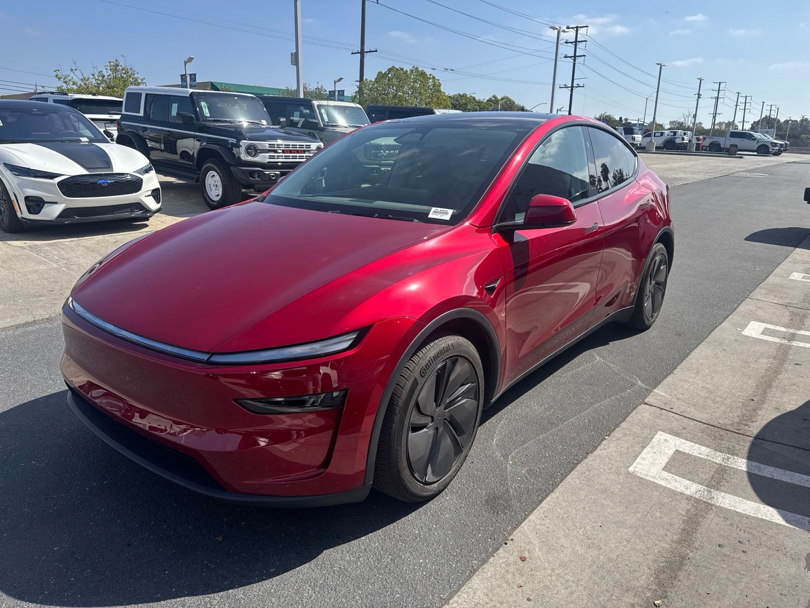 Red 2026 Tesla Model Y SUV / Crossover Rear-Wheel Drive 1-Speed Automatic