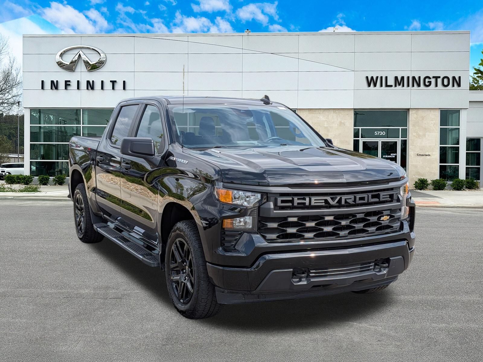 Black 2025 Chevrolet Silverado 1500 Custom Crew Cab 4WD Pickup Truck Four-Wheel Drive 8-Speed Automatic