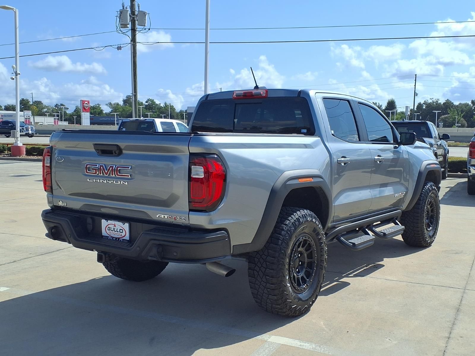 2024 GMC Canyon AT4X Silver at Classic Chevrolet Galveston