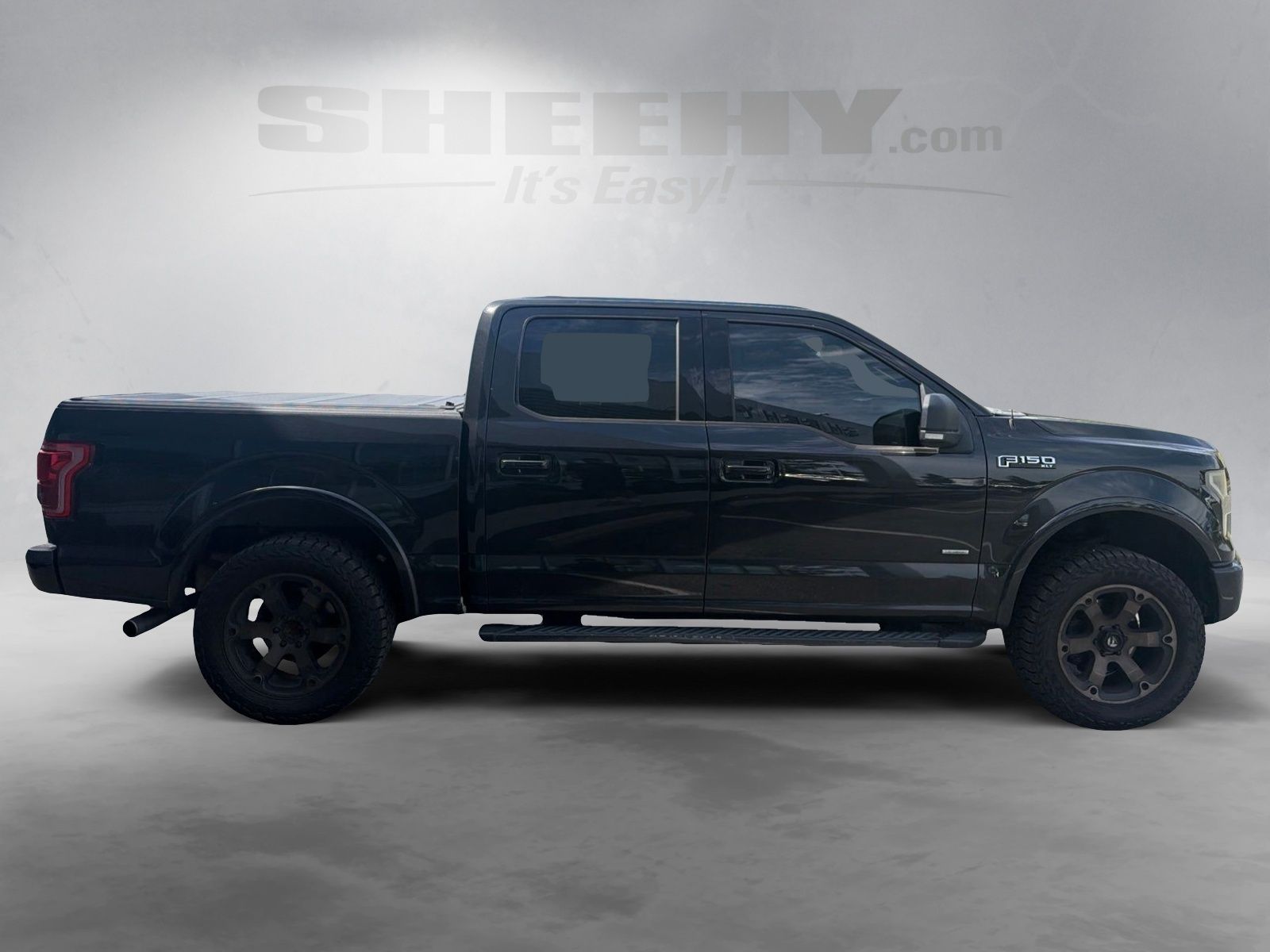 Used 2015 Tuxedo Black Metallic Ford XLT image 10