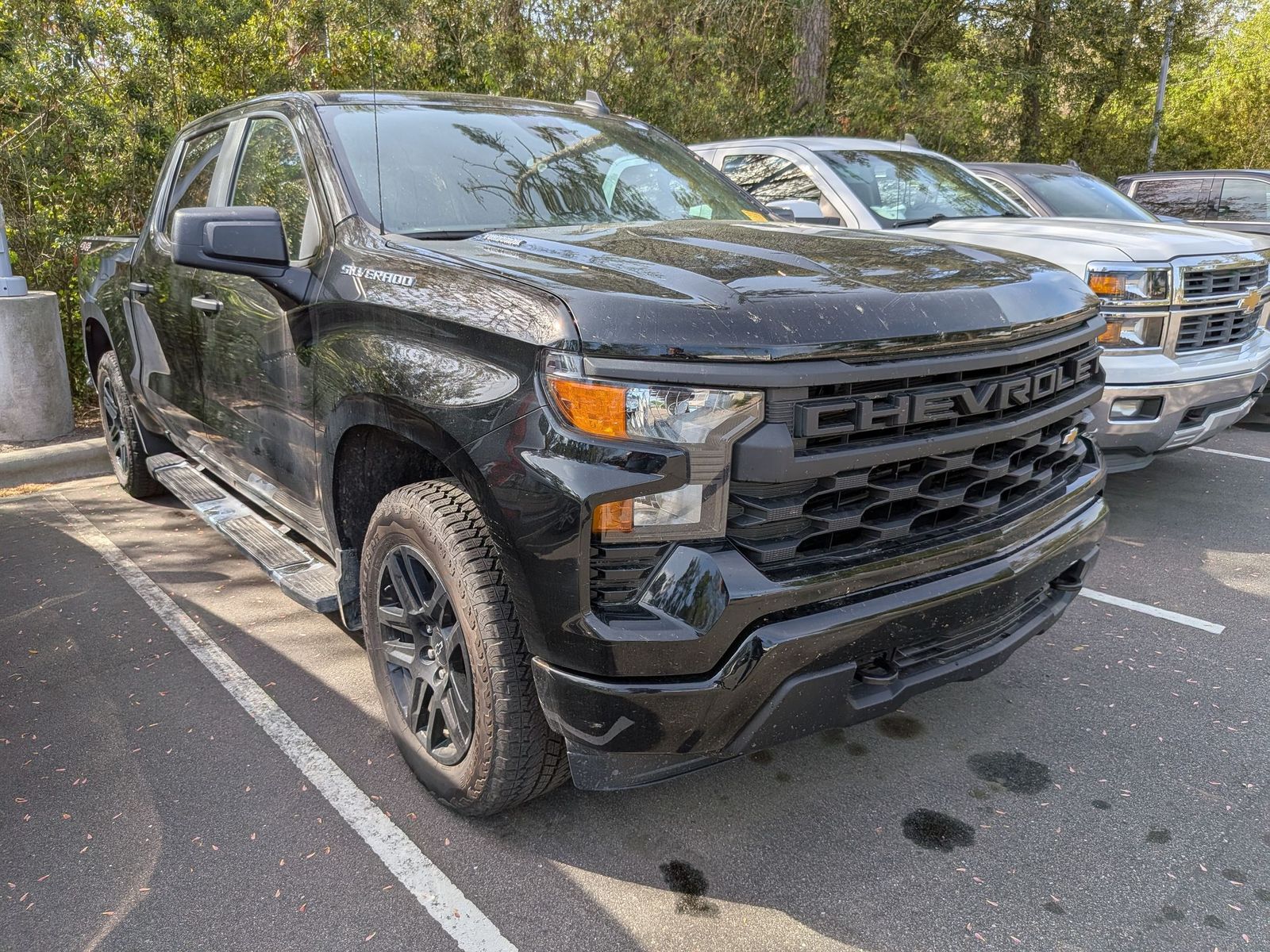 Black 2025 Chevrolet Silverado 1500 Custom Crew Cab 4WD Pickup Truck Four-Wheel Drive 8-Speed Automatic
