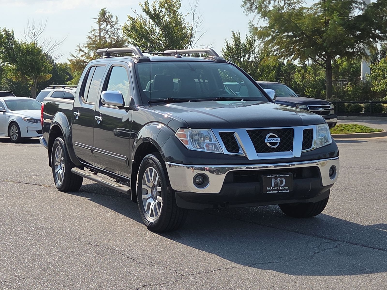 Gray 2010 Nissan Frontier Pickup Truck Four-Wheel Drive 5-Speed Automatic Overdrive