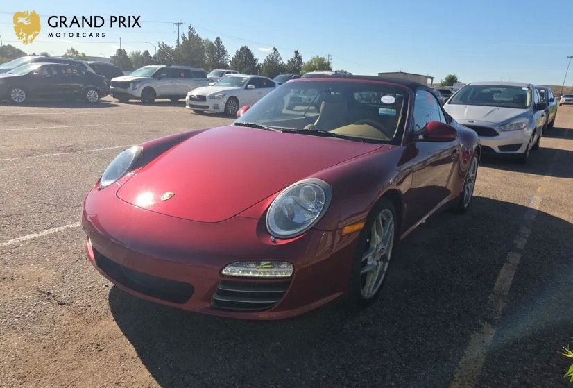 Ruby Red Metallic 2009 Porsche 911 Convertible All-Wheel Drive 7-Speed Automatic