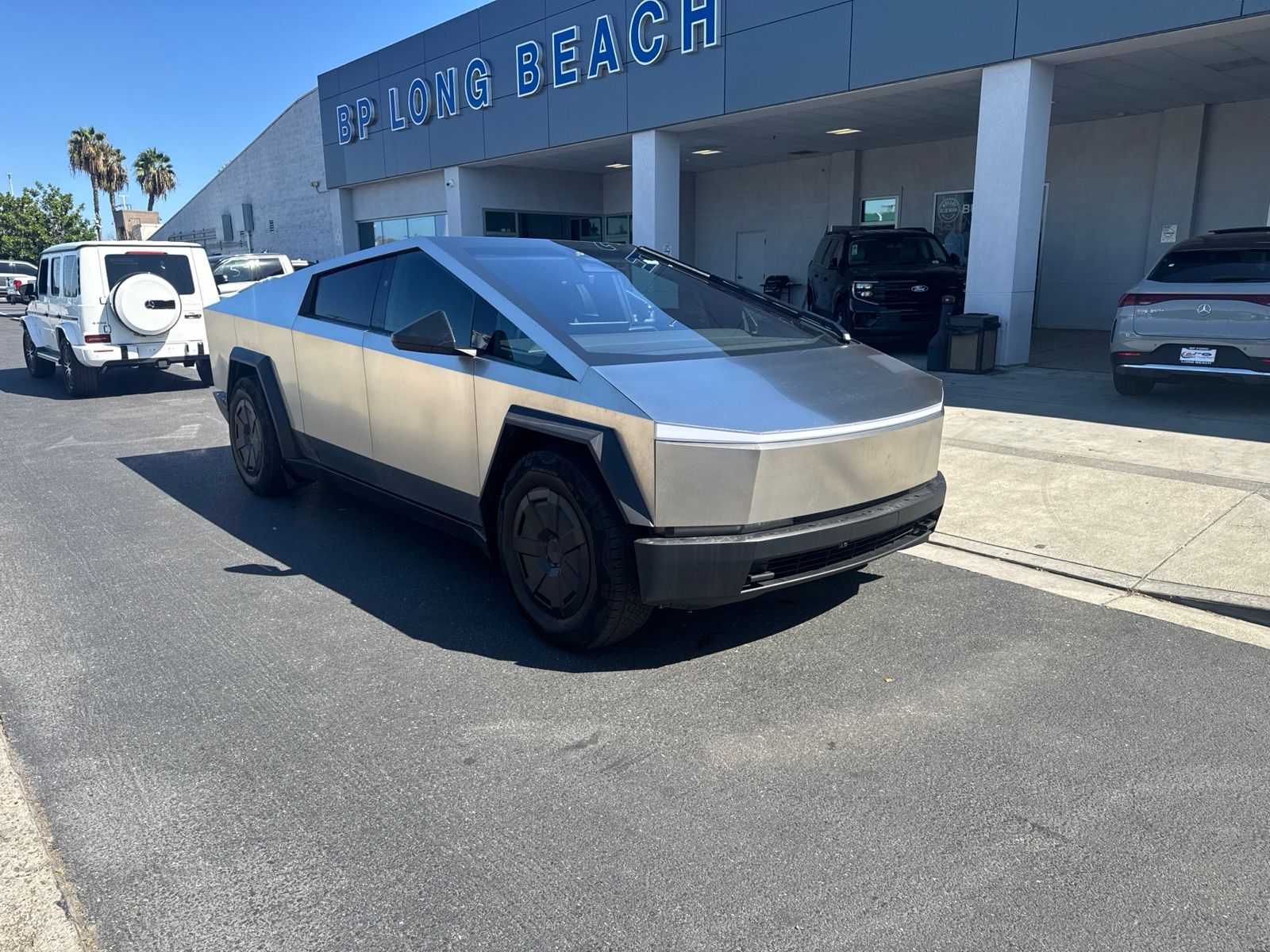 Silver 2024 Tesla Cybertruck Pickup Truck All-Wheel Drive 1-Speed Automatic