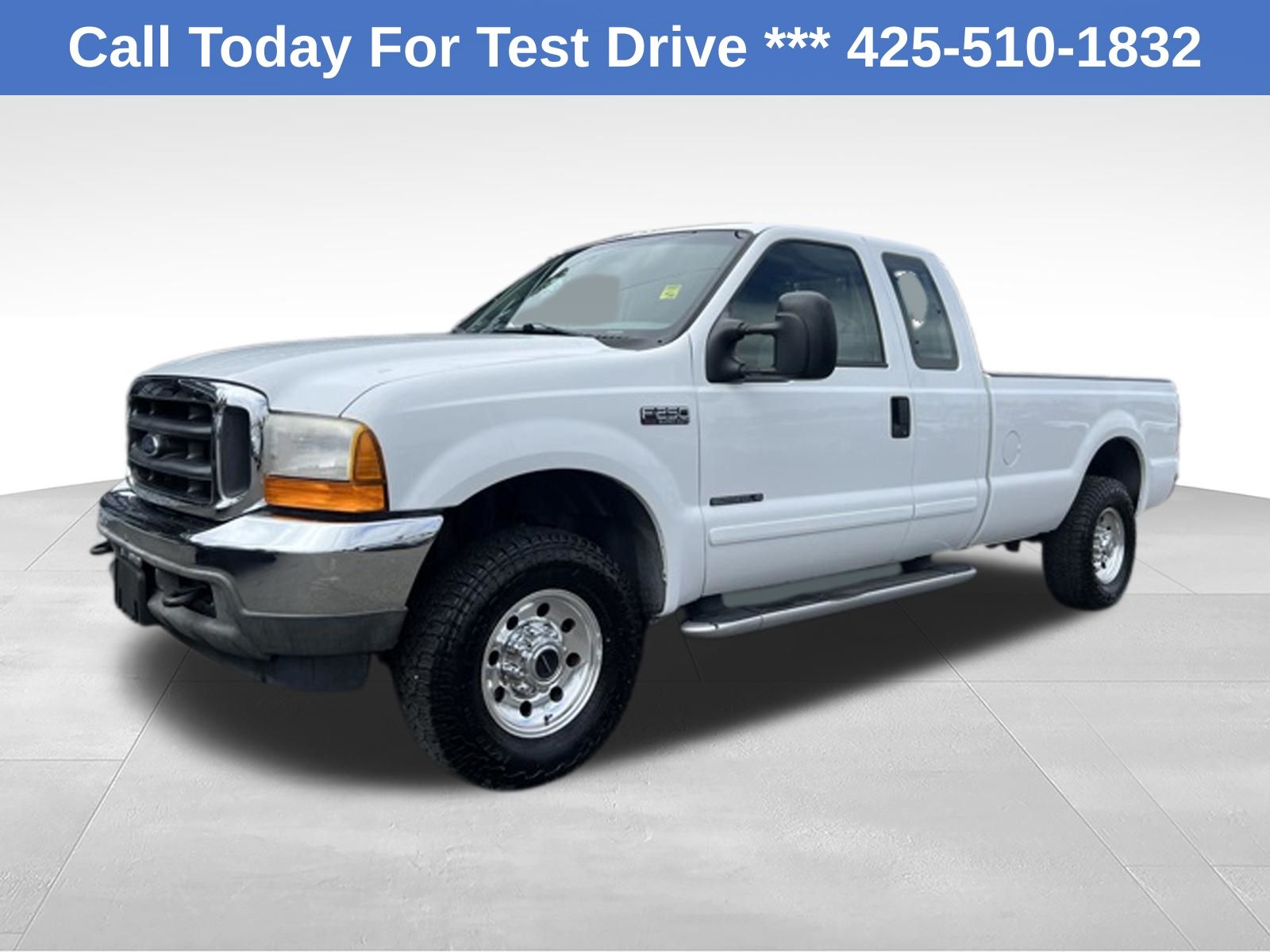 White 2001 Ford F-250 Super Duty Pickup Truck Four-Wheel Drive 4-Speed Automatic