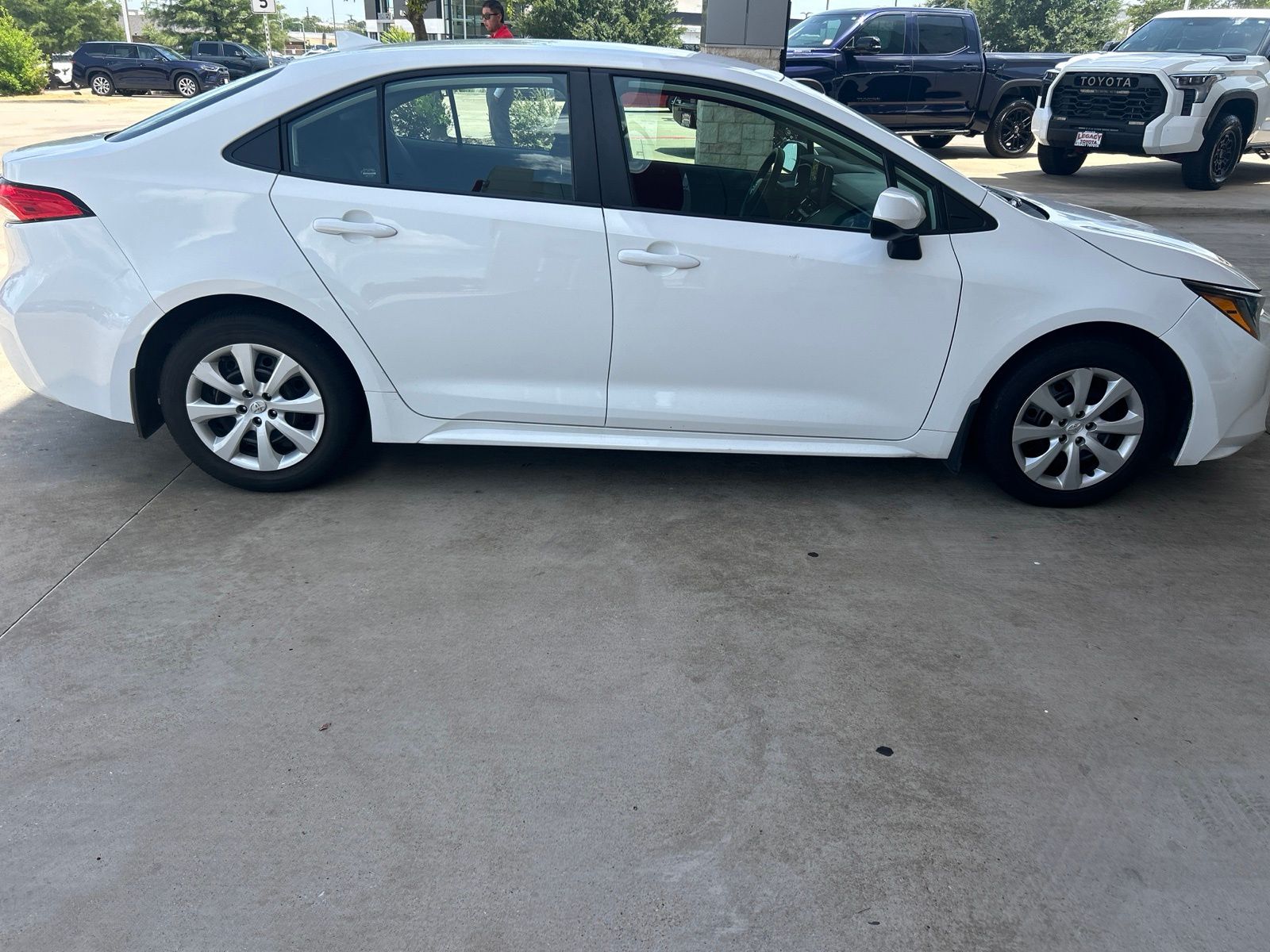 Used 2024 White Toyota LE image 7