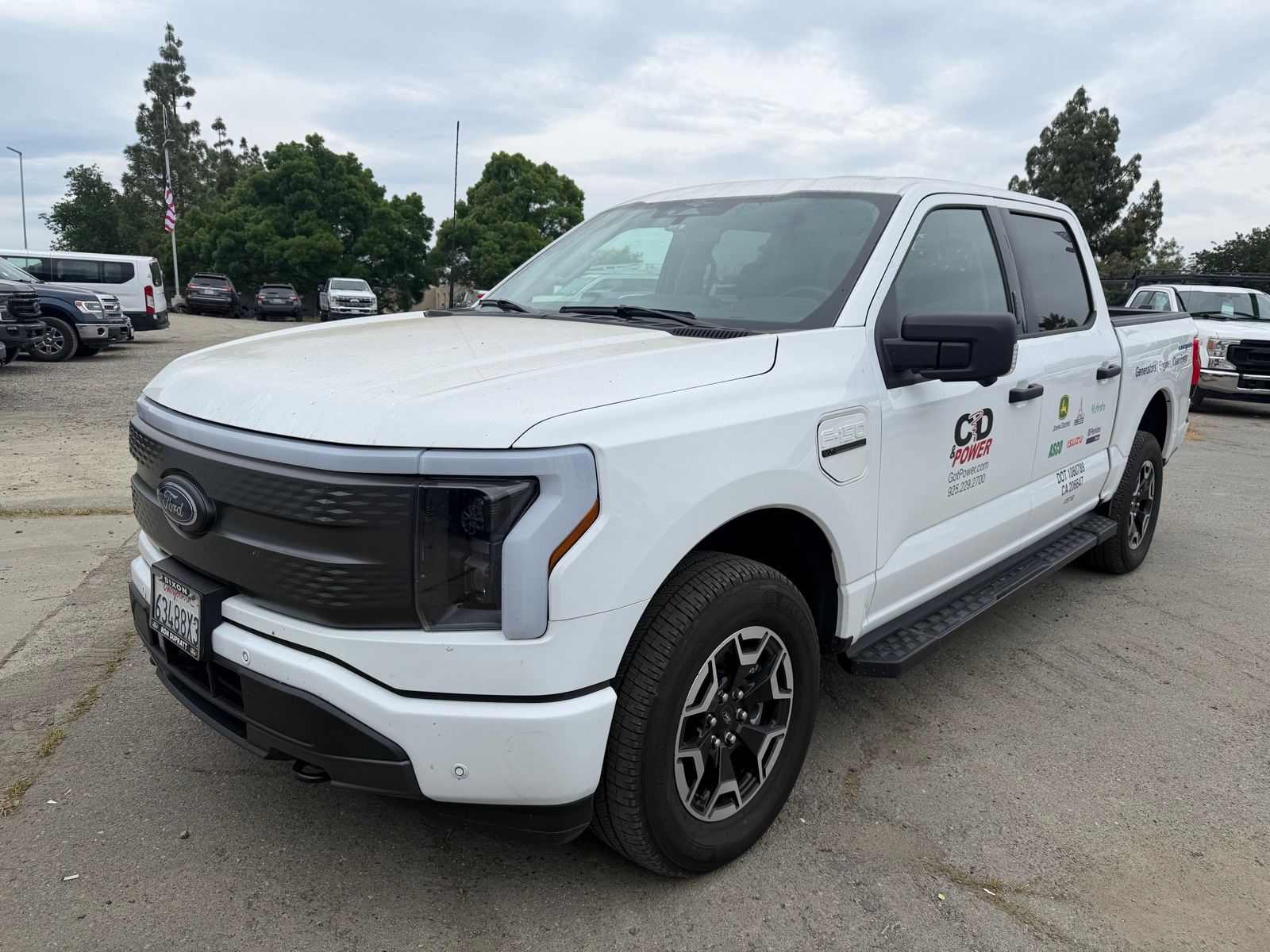 Oxford White 2023 Ford F-150 Lightning XLT SuperCrew AWD Pickup Truck All-Wheel Drive Automatic