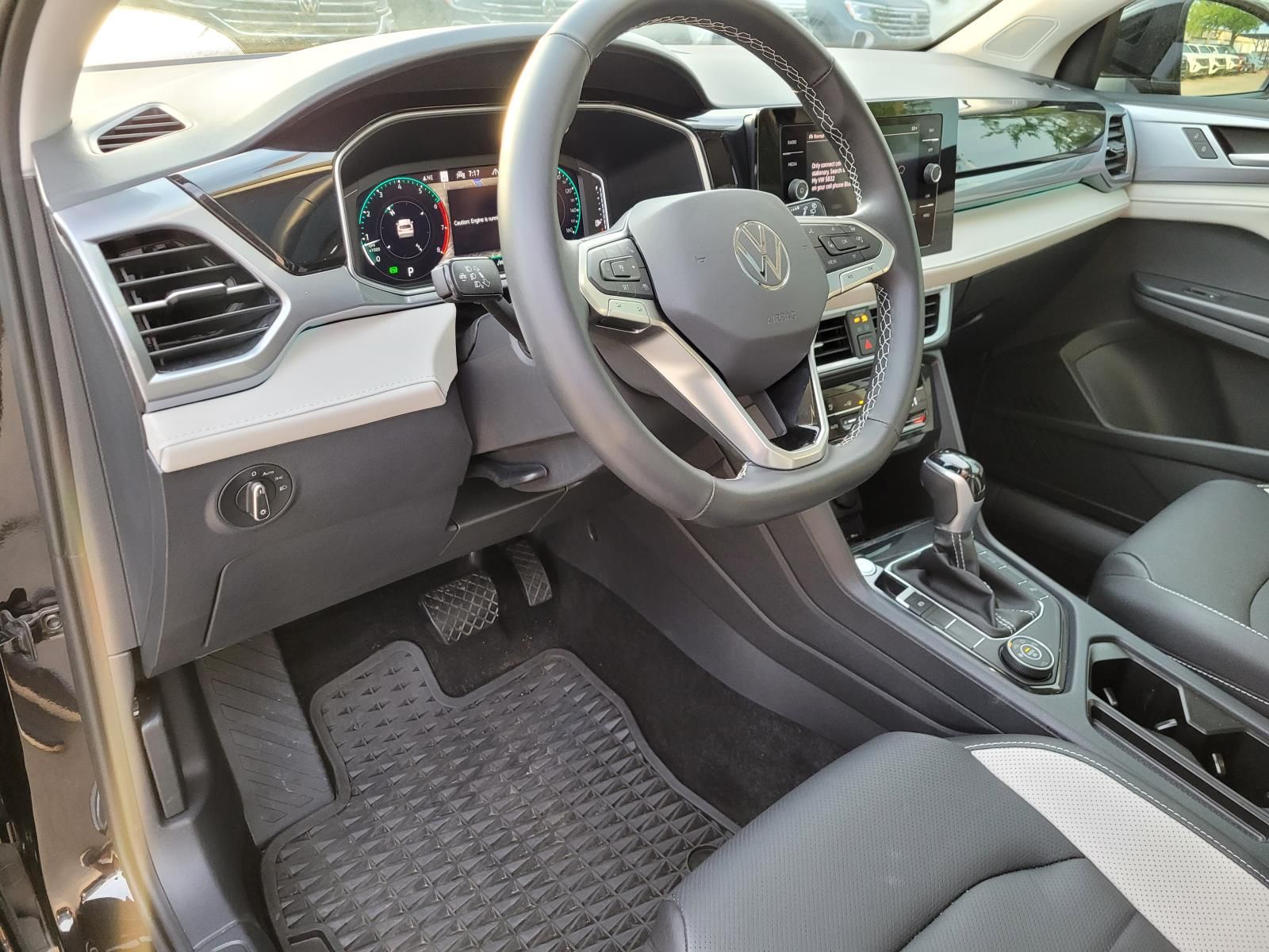 used 2025 Volkswagen Taos car, priced at $32,000