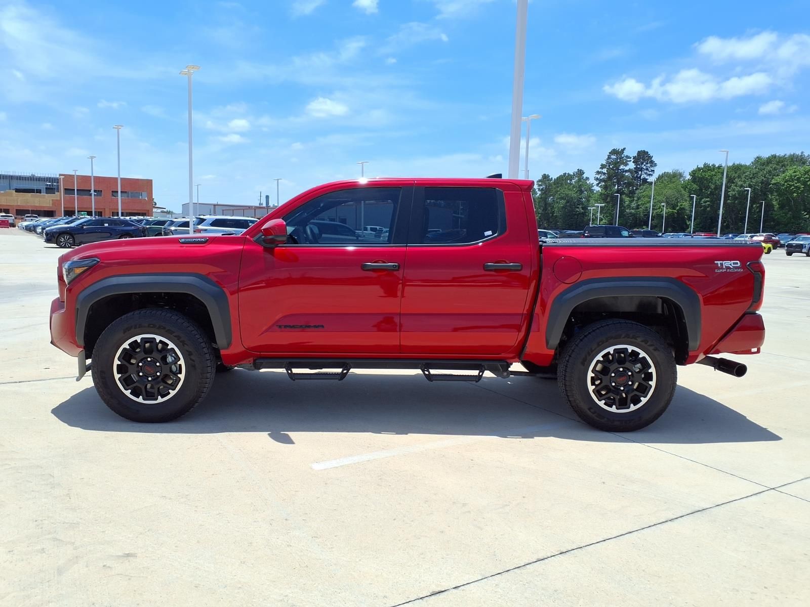 2025 Toyota Tacoma Hybrid TRD Off Road Red at EAG Ford Navasota
