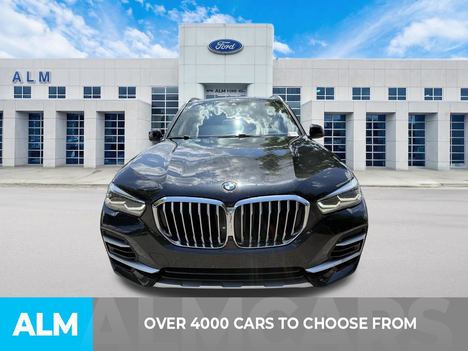 Used 2023 Black Sapphire Metallic BMW sDrive40i image 2