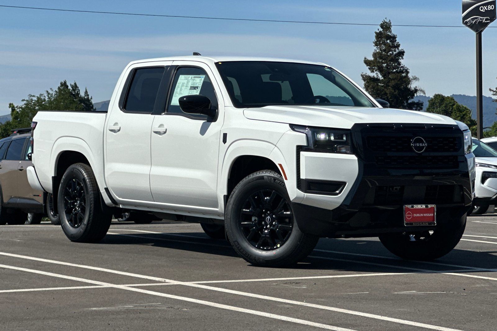 Glacier White 2026 Nissan Frontier Pickup Truck 4X2 9-Speed Automatic Overdrive
