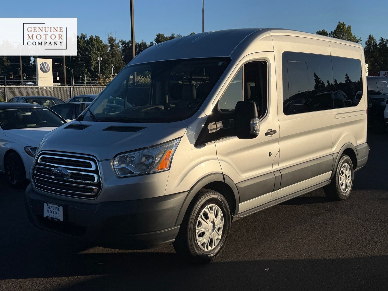 Ingot Silver 2017 Ford Transit Passenger 150 XLT Medium Roof RWD with Sliding Passenger-Side Door Van Rear-Wheel Drive 6-Speed Automatic Overdrive