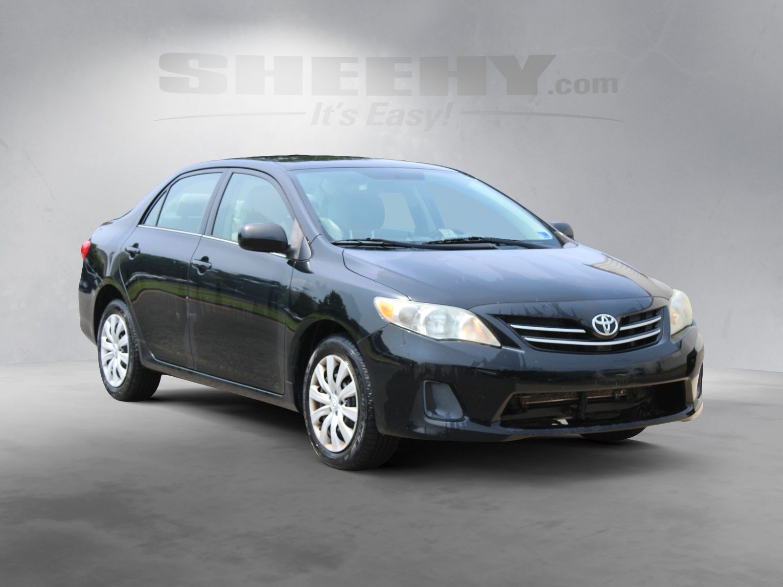 Used 2013 Black Toyota LE image 2